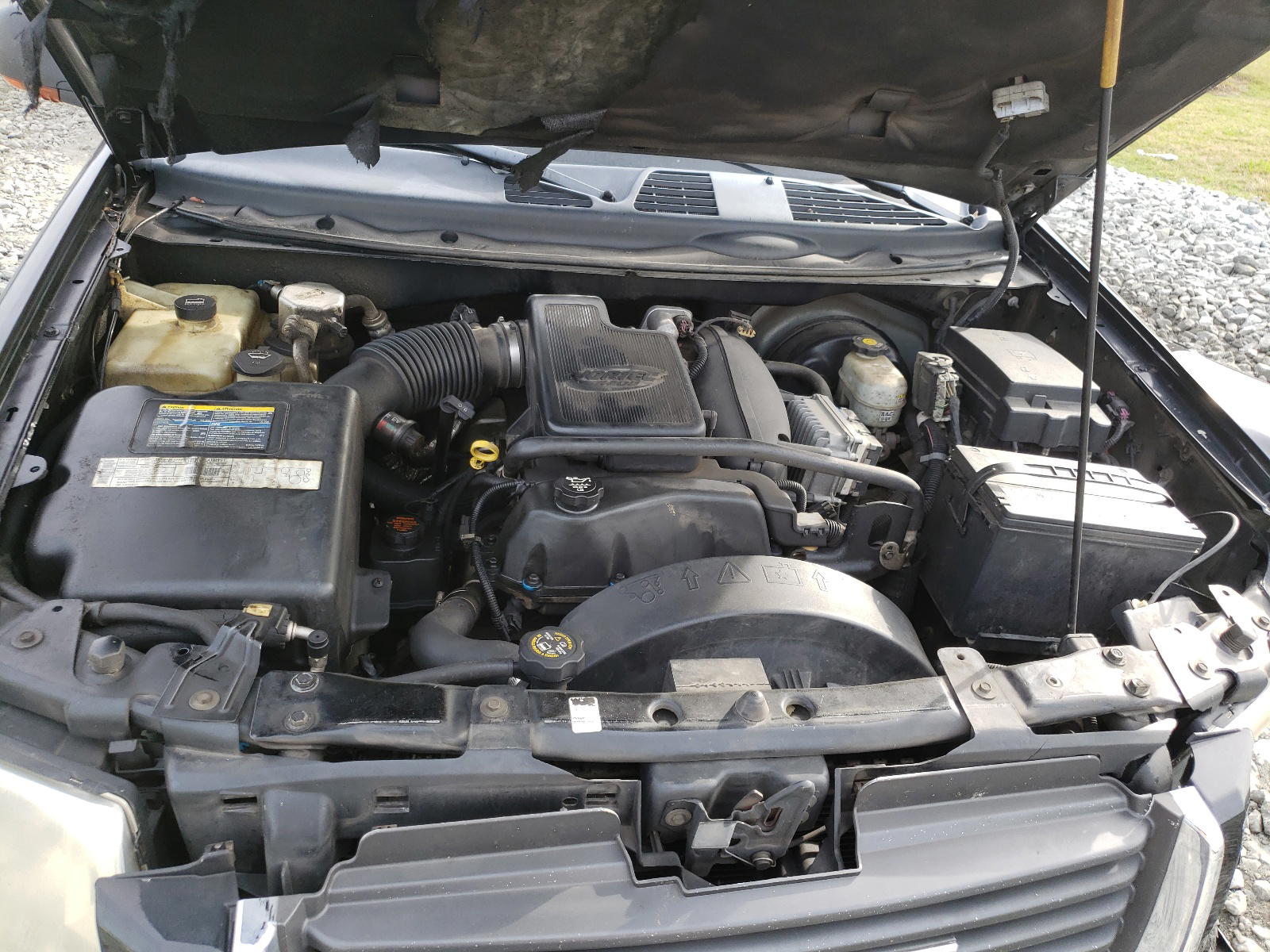 Photo 7 from auction – 2002 GMC ENVOY with VIN 1GKDT13S022522800