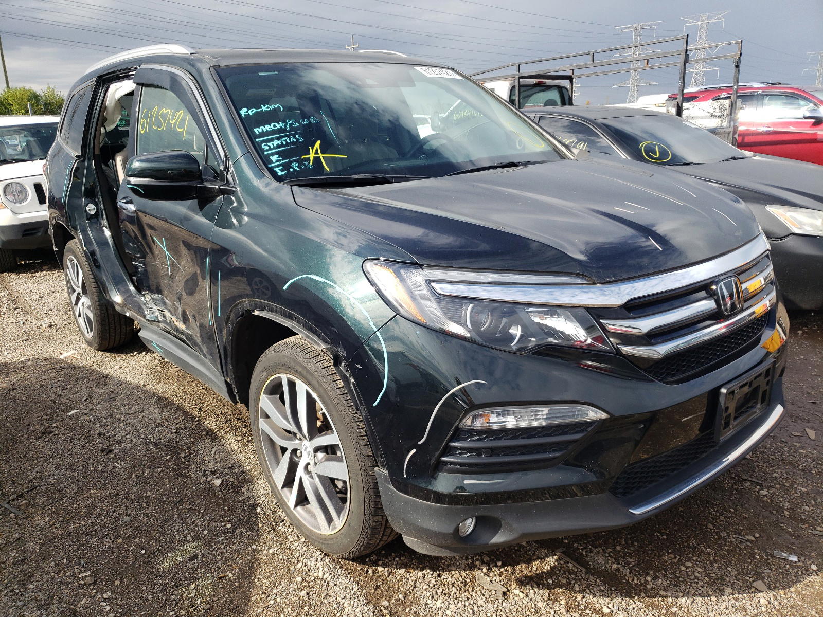 HONDA PILOT ELIT 2017 with VIN 5FNYF6H09HB101155 - Photo from auction