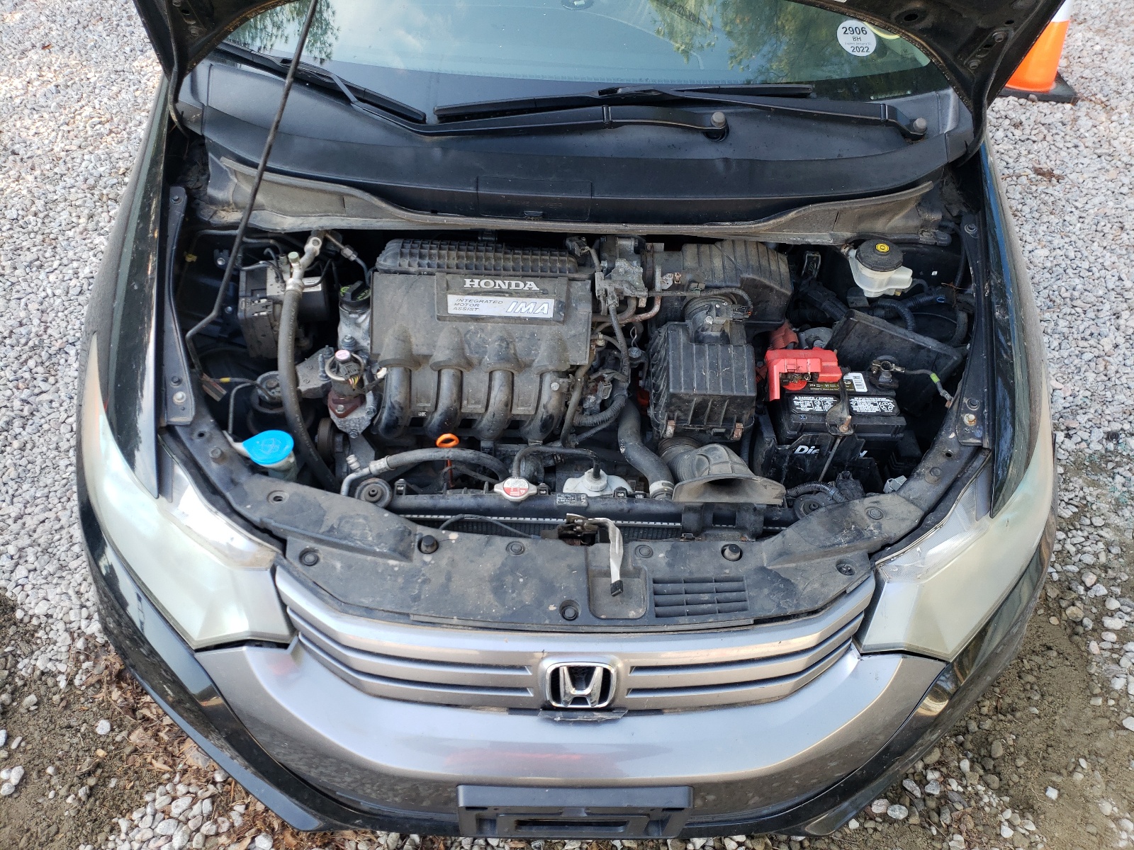 Photo 7 from auction – 2010 HONDA INSIGHT EX with VIN JHMZE2H7XAS041133