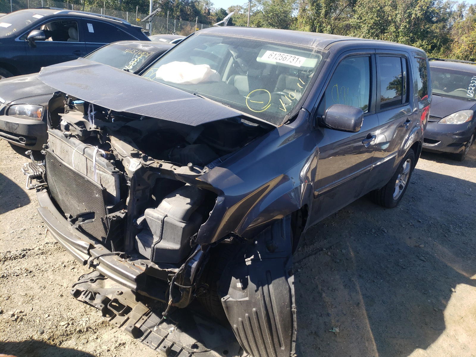 Photo 2 from auction – 2015 HONDA PILOT EXL with VIN 5FNYF4H50FB023717