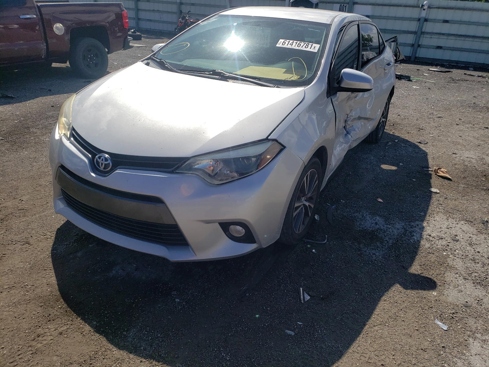 Photo 2 from auction – 2016 TOYOTA COROLLA L with VIN 5YFBURHE0GP380409