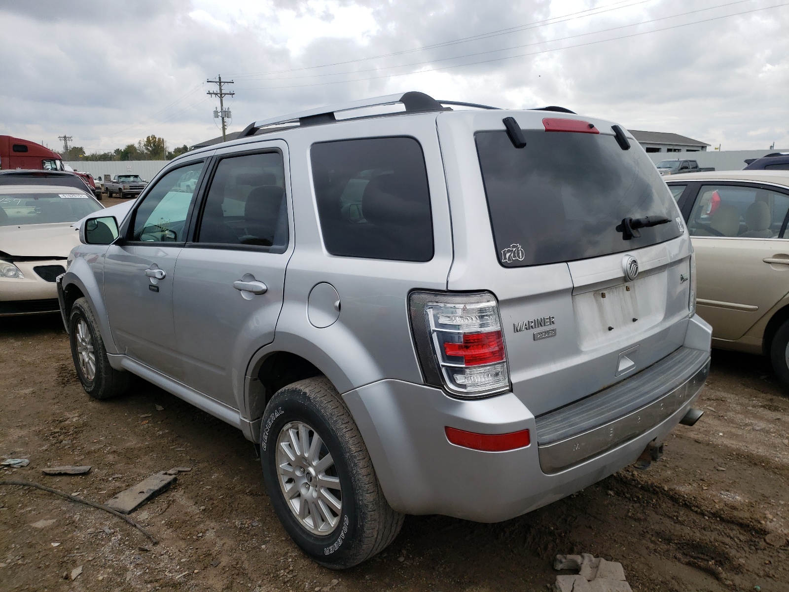 Photo 3 from auction – 2010 MERCURY MARINER with VIN 4M2CN9HG9AKJ22506