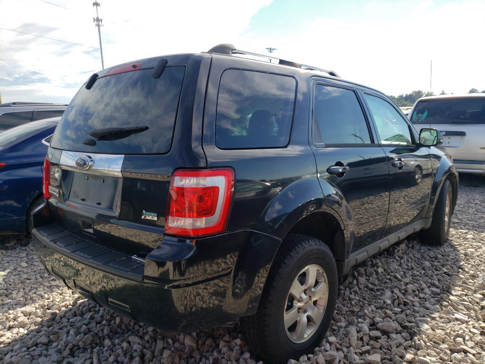 Photo 4 from auction – 2011 FORD ESCAPE LIM with VIN 1FMCU9EG5BKA75078