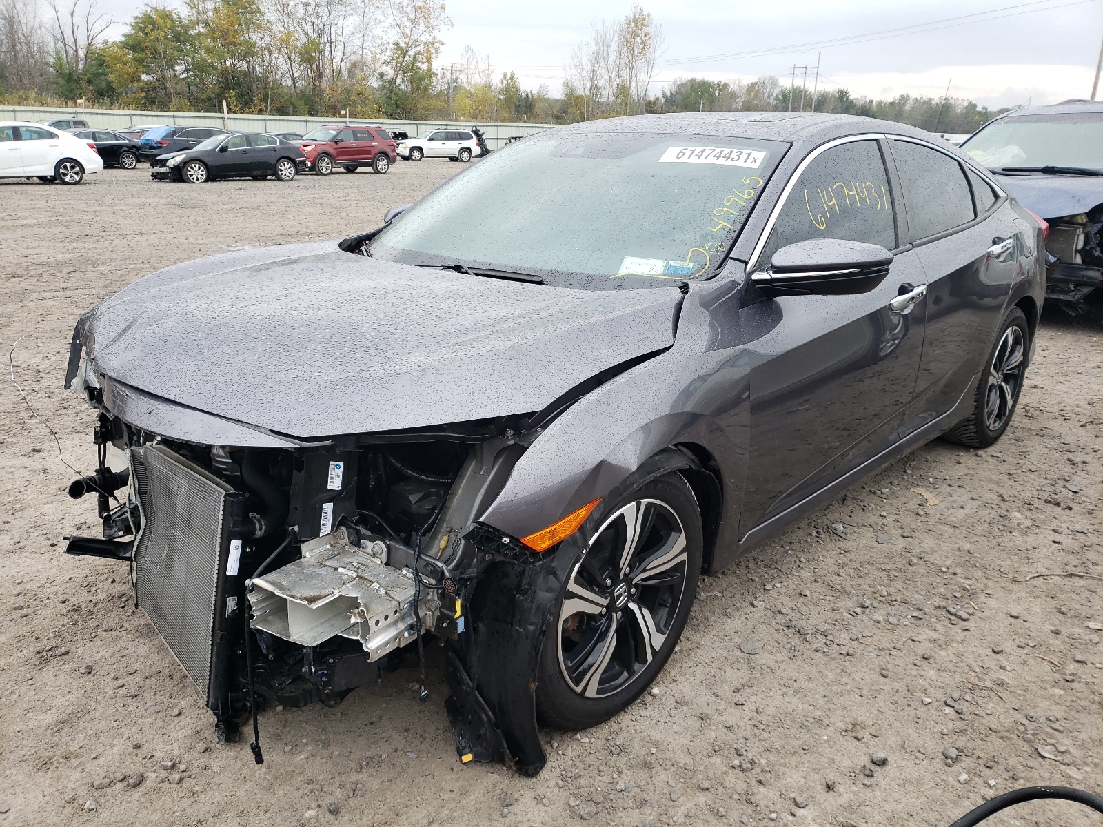 Photo 2 from auction – 2016 HONDA CIVIC TOUR with VIN 19XFC1F92GE210467