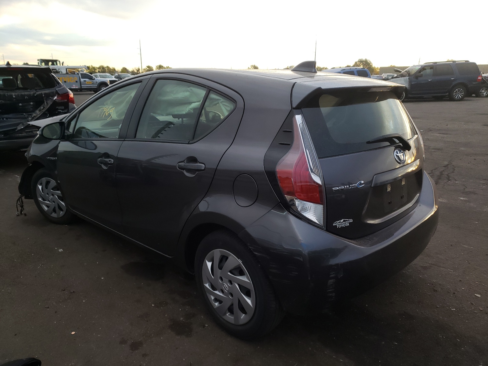Photo 3 from auction – 2015 TOYOTA PRIUS C with VIN JTDKDTB37F1579660