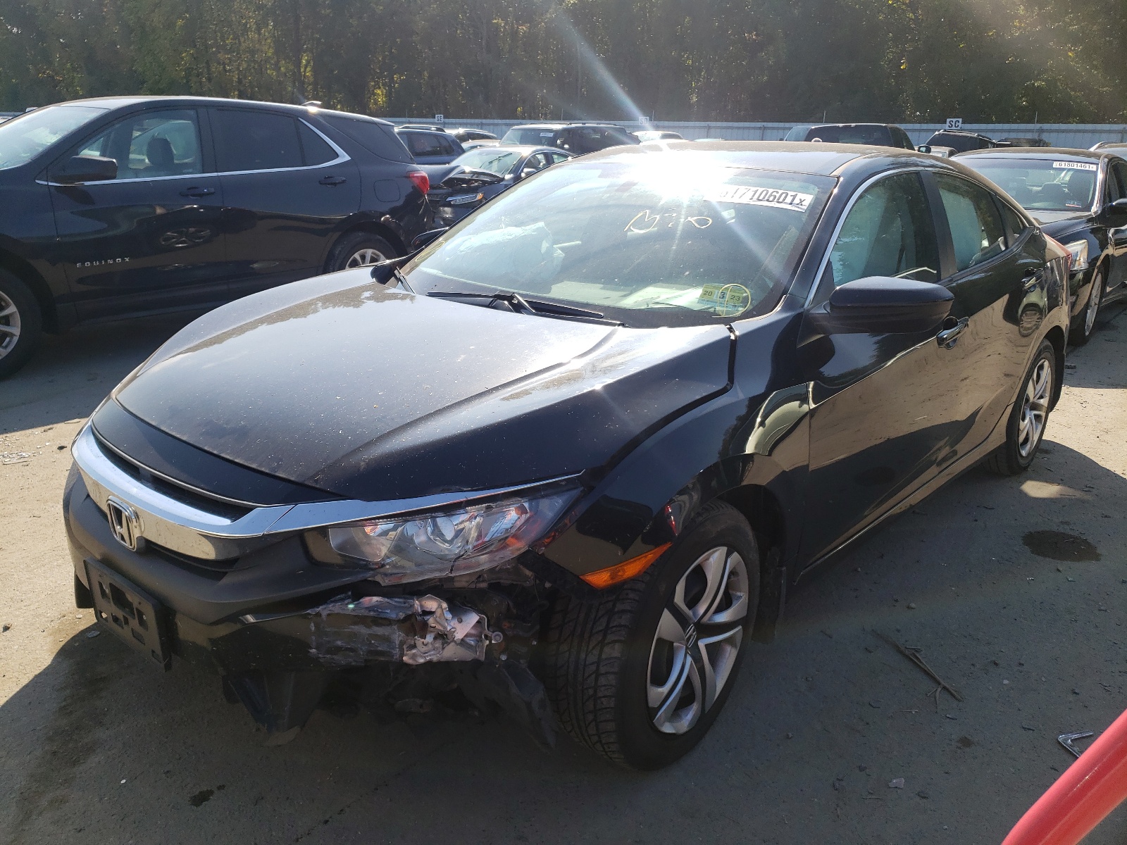Photo 2 from auction – 2016 HONDA CIVIC LX with VIN 19XFC2F51GE076070