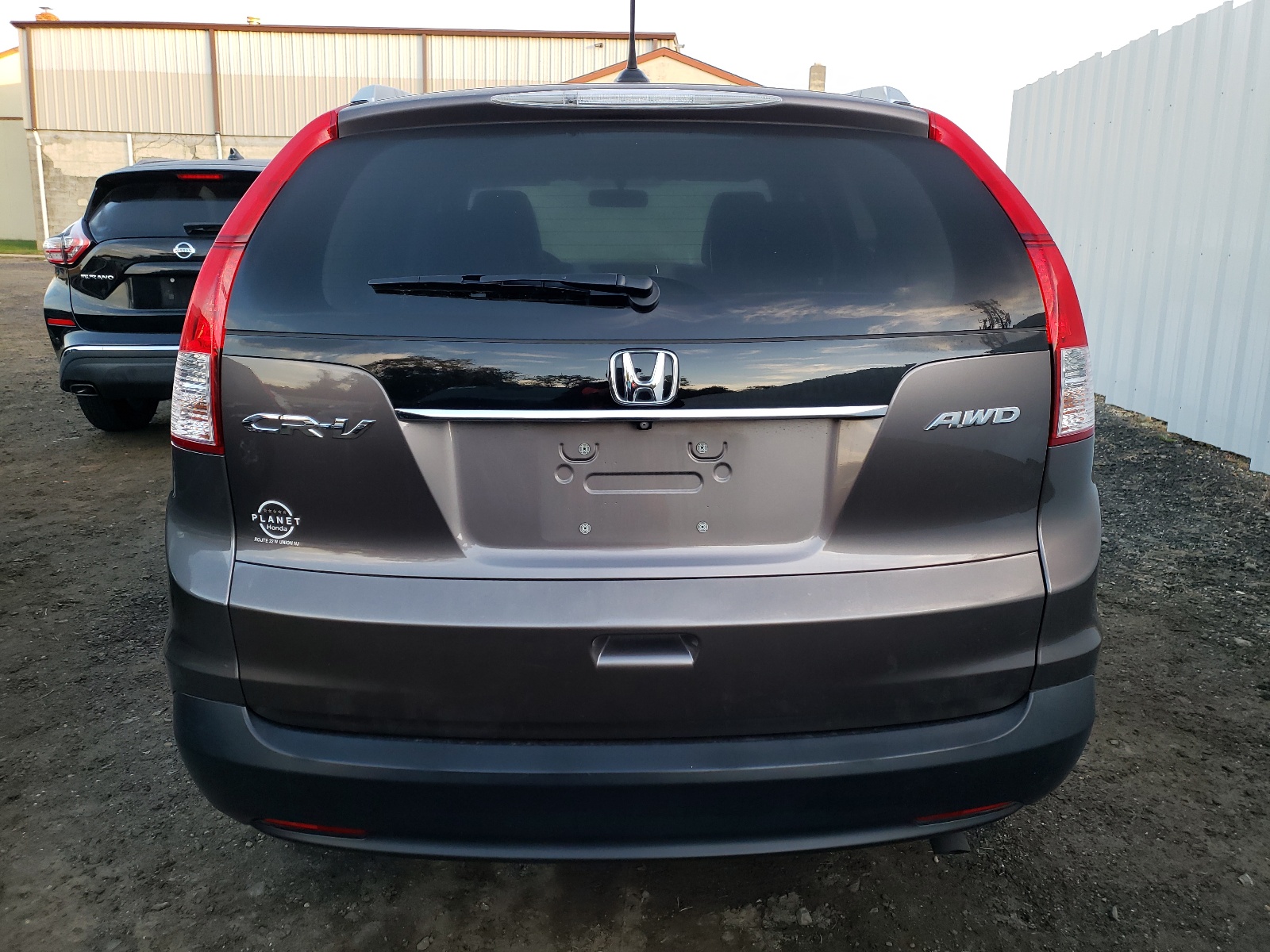 Photo 9 from auction – 2014 HONDA CR-V EXL with VIN 2HKRM4H78EH667350
