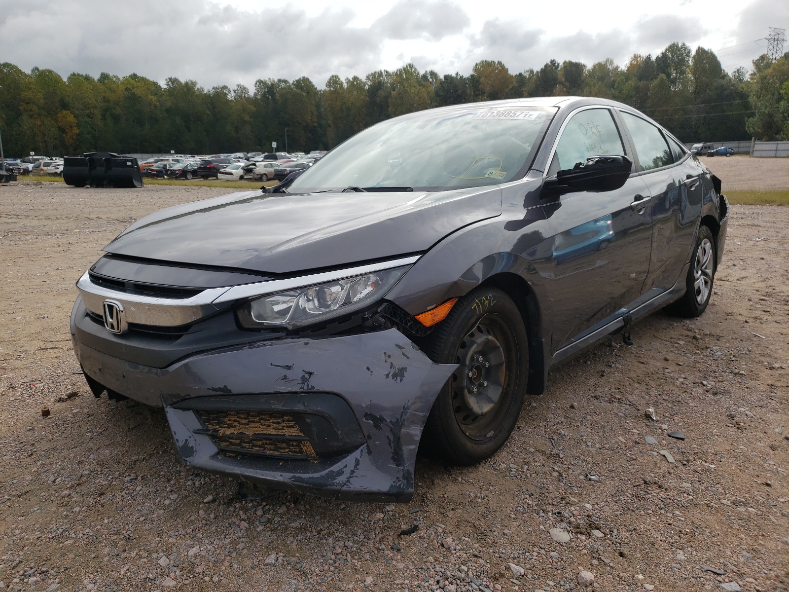 Photo 2 from auction – 2017 HONDA CIVIC LX with VIN 2HGFC2F51HH553149
