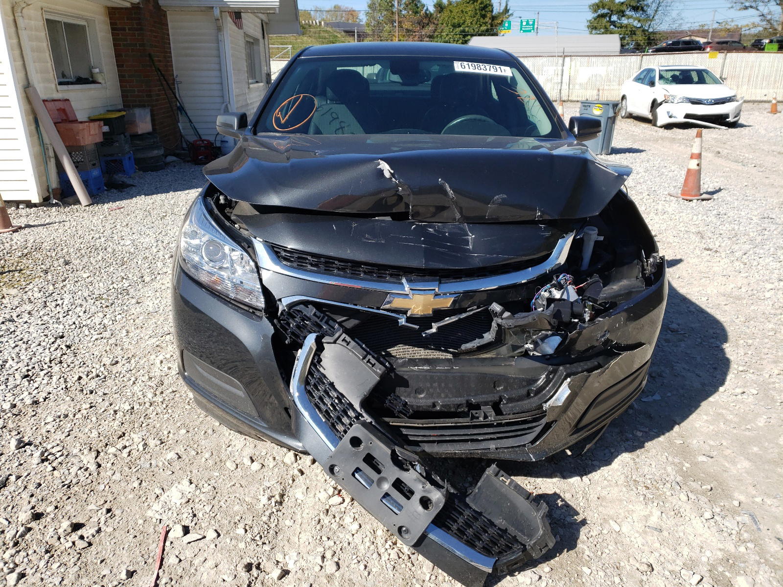 Photo 9 from auction – 2015 CHEVROLET MALIBU with VIN 1G11C5SL1FF130903