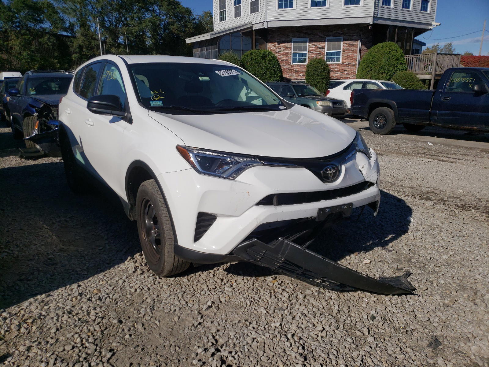 TOYOTA RAV4 LE 2018 with VIN 2T3BFREV7JW765008 - Photo from auction
