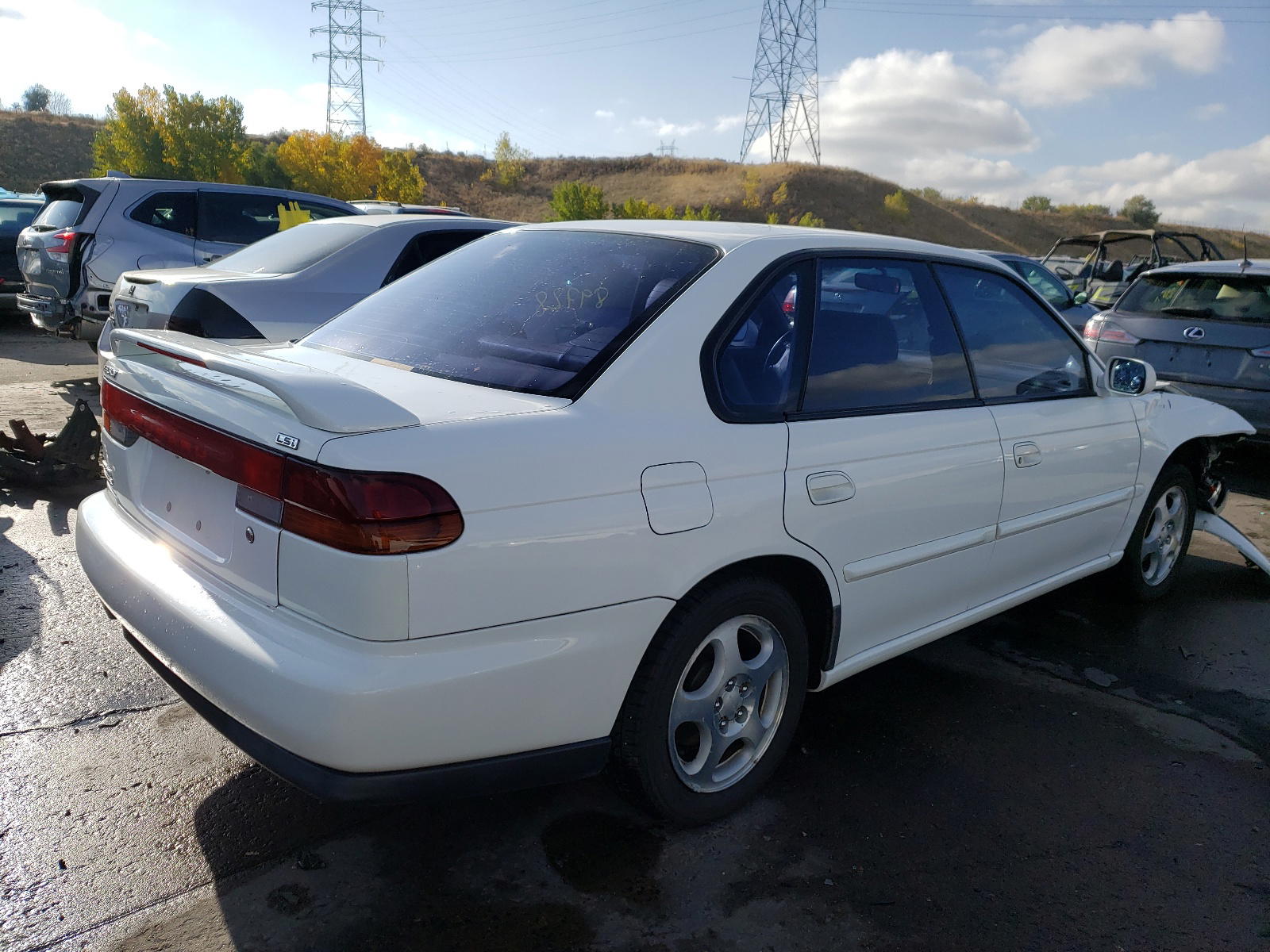 Photo 4 from auction – 1995 SUBARU LEGACY LS with VIN 4S3BD6550S7229129