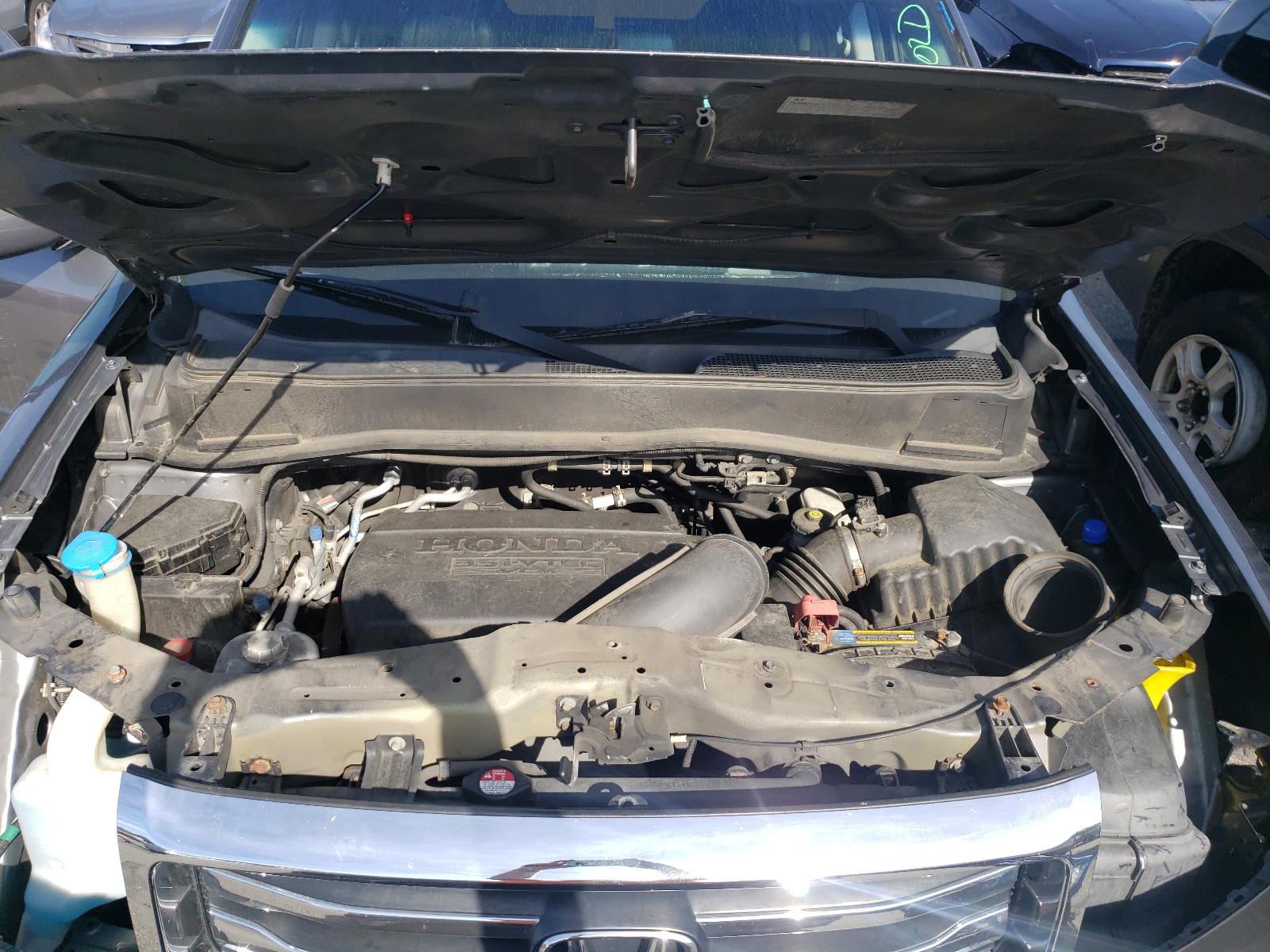 Photo 12 from auction – 2012 HONDA PILOT with VIN 5FNYF4H54CB074567