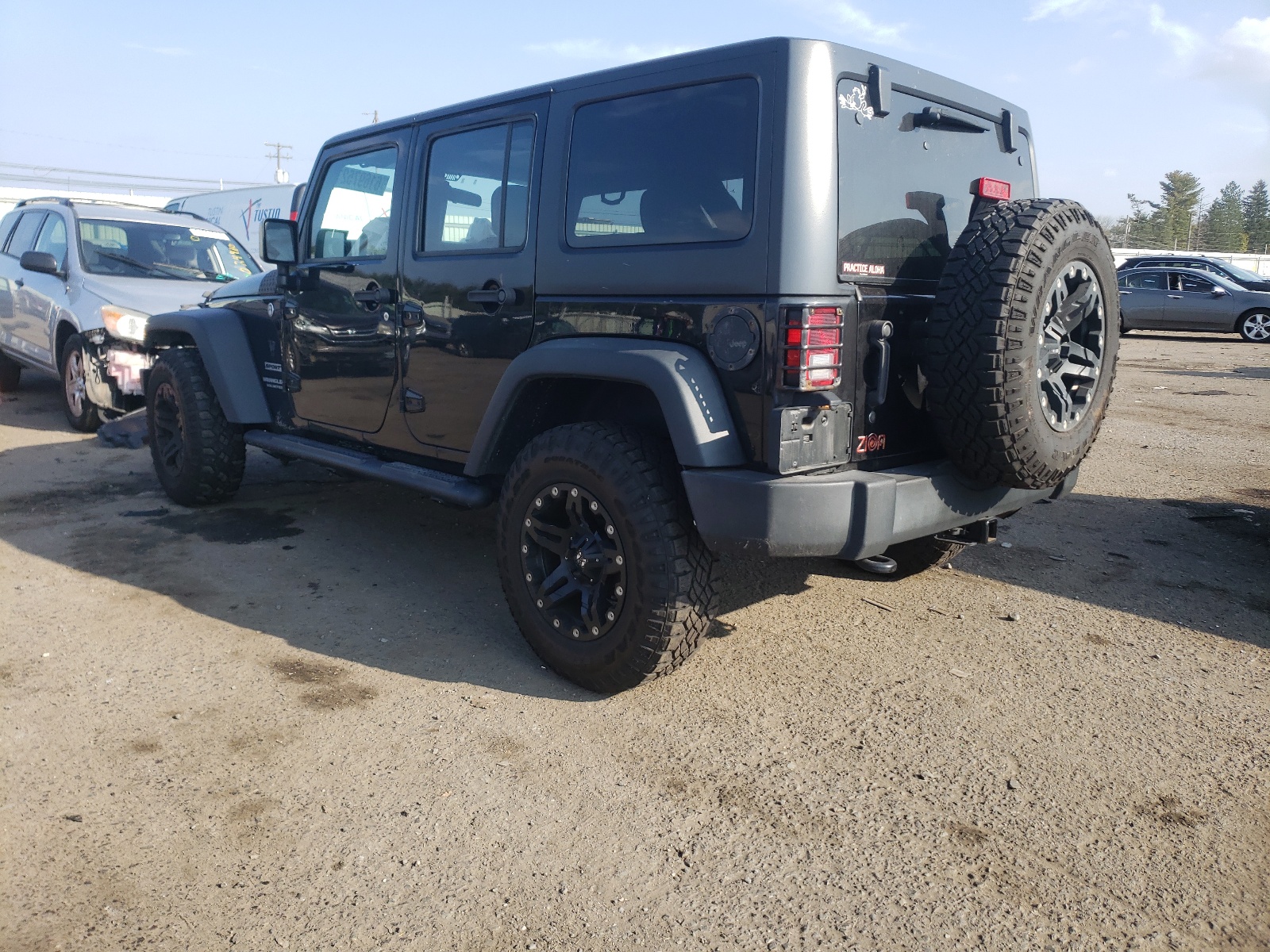 Photo 3 from auction – 2015 JEEP WRANGLER U with VIN 1C4BJWDG0FL682725