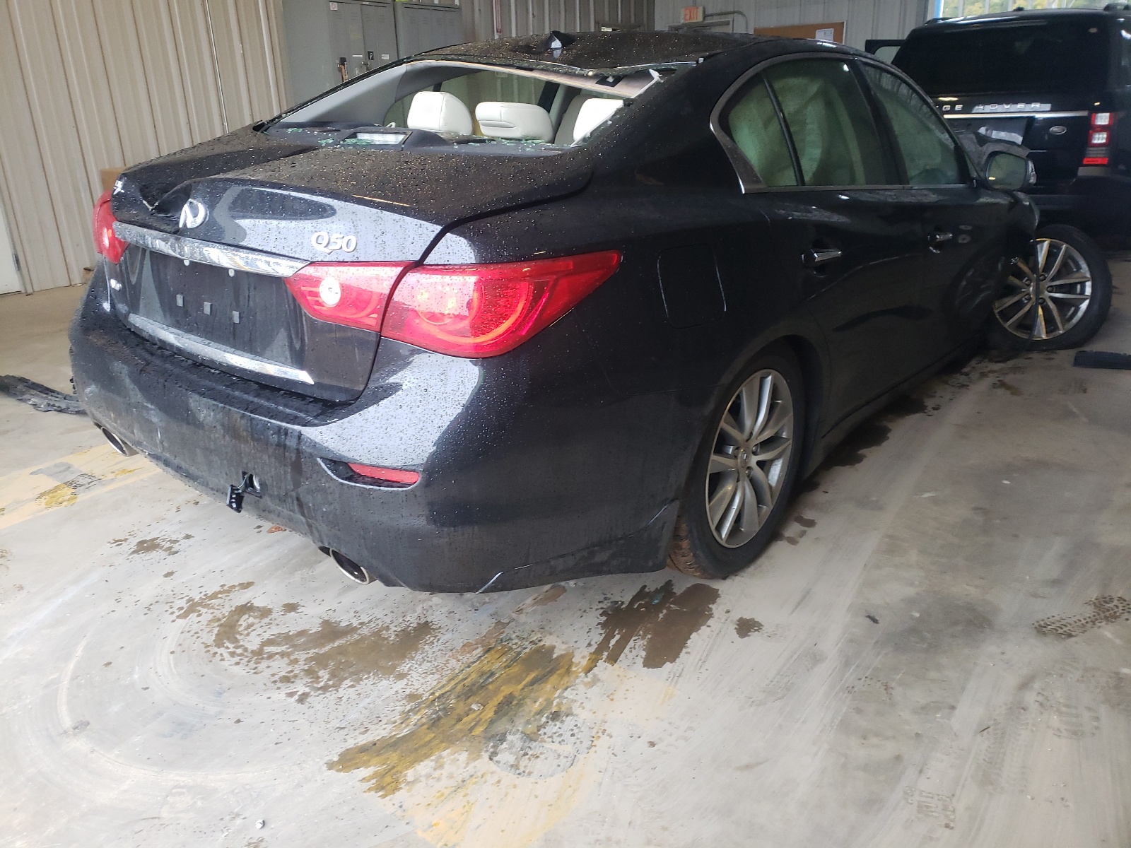 Photo 4 from auction – 2015 INFINITI Q50 BASE with VIN JN1BV7AR6FM414064