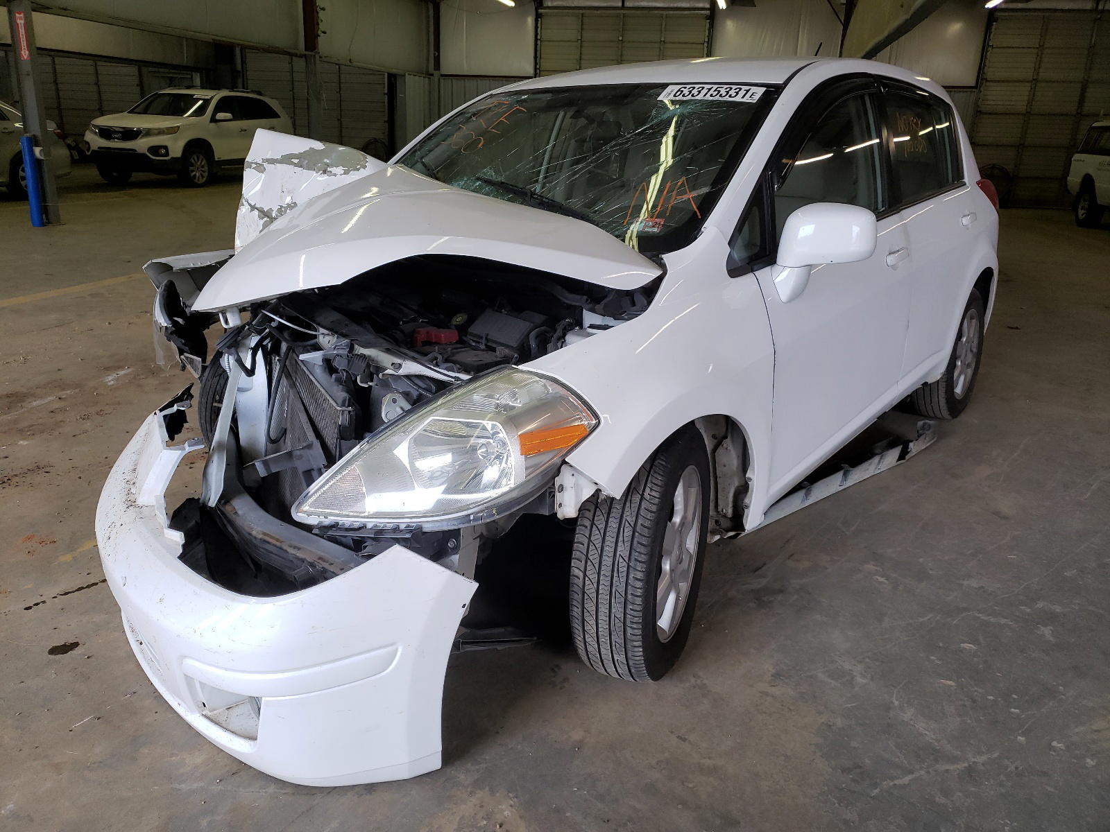 Photo 2 from auction – 2011 NISSAN VERSA S with VIN 3N1BC1CP5BL412244