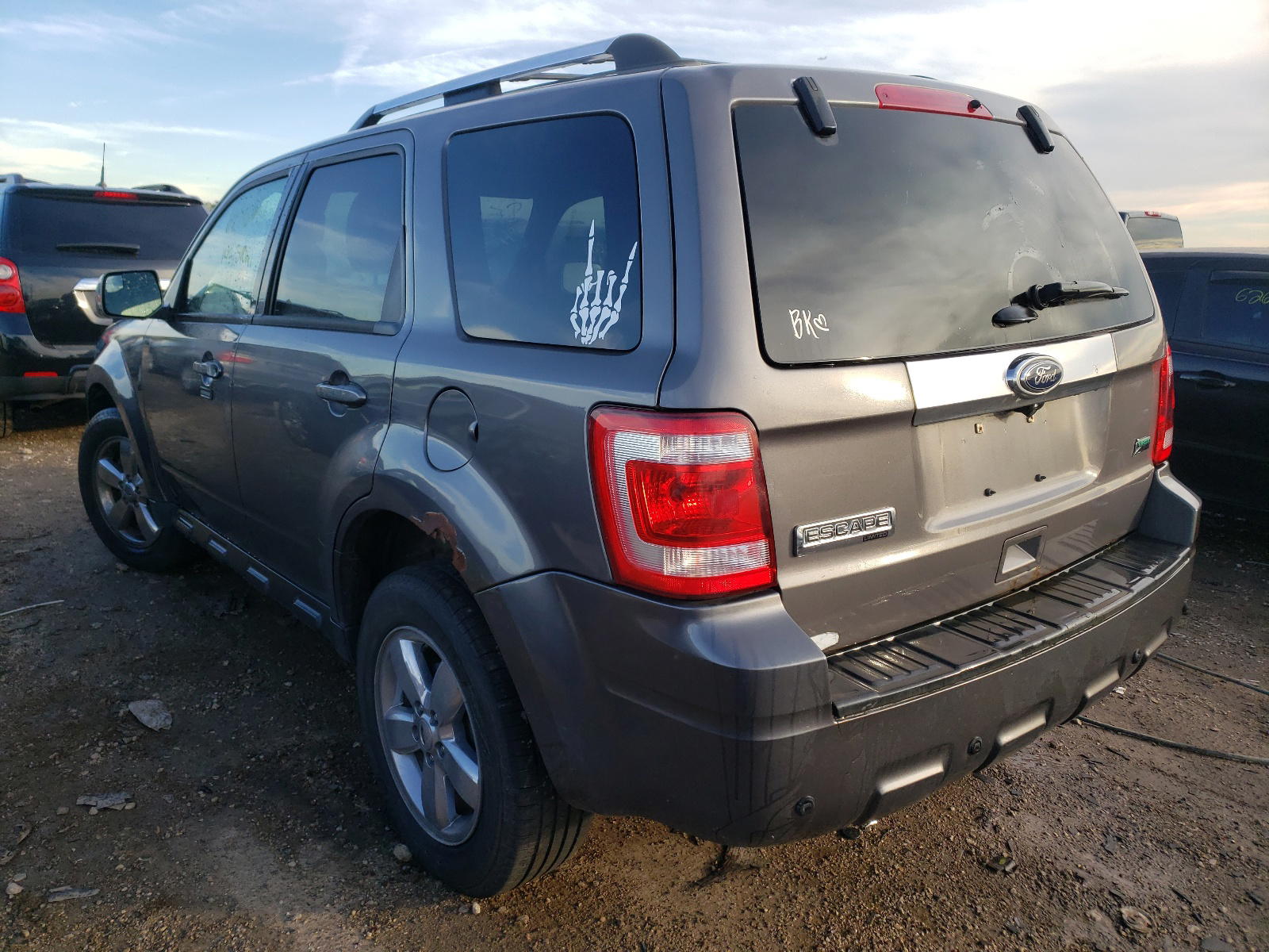 Photo 3 from auction – 2011 FORD ESCAPE LIM with VIN 1FMCU9EG6BKB11036