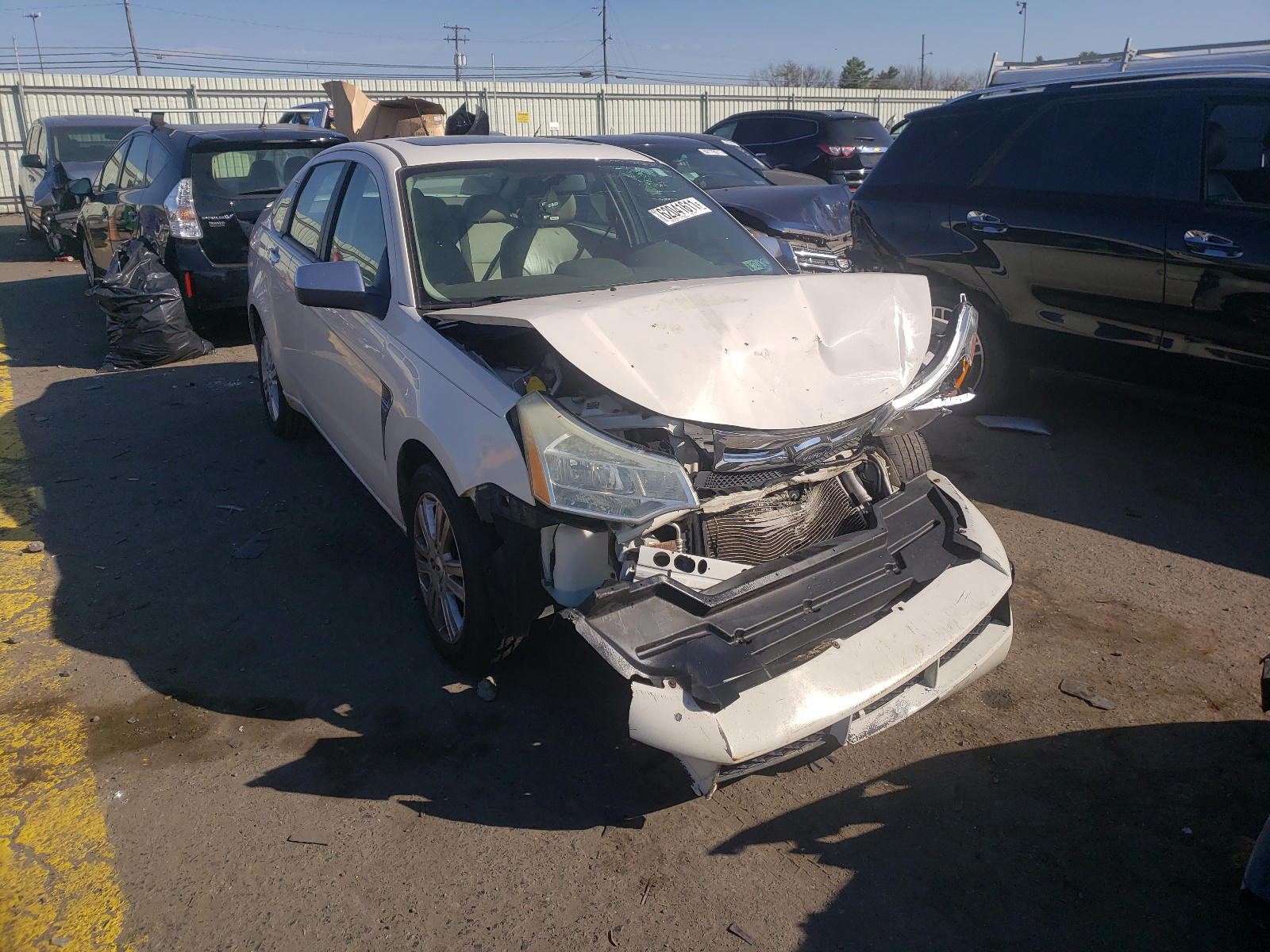 FORD FOCUS SEL 2011 with VIN 1FAHP3HN3BW115083 - Photo from auction