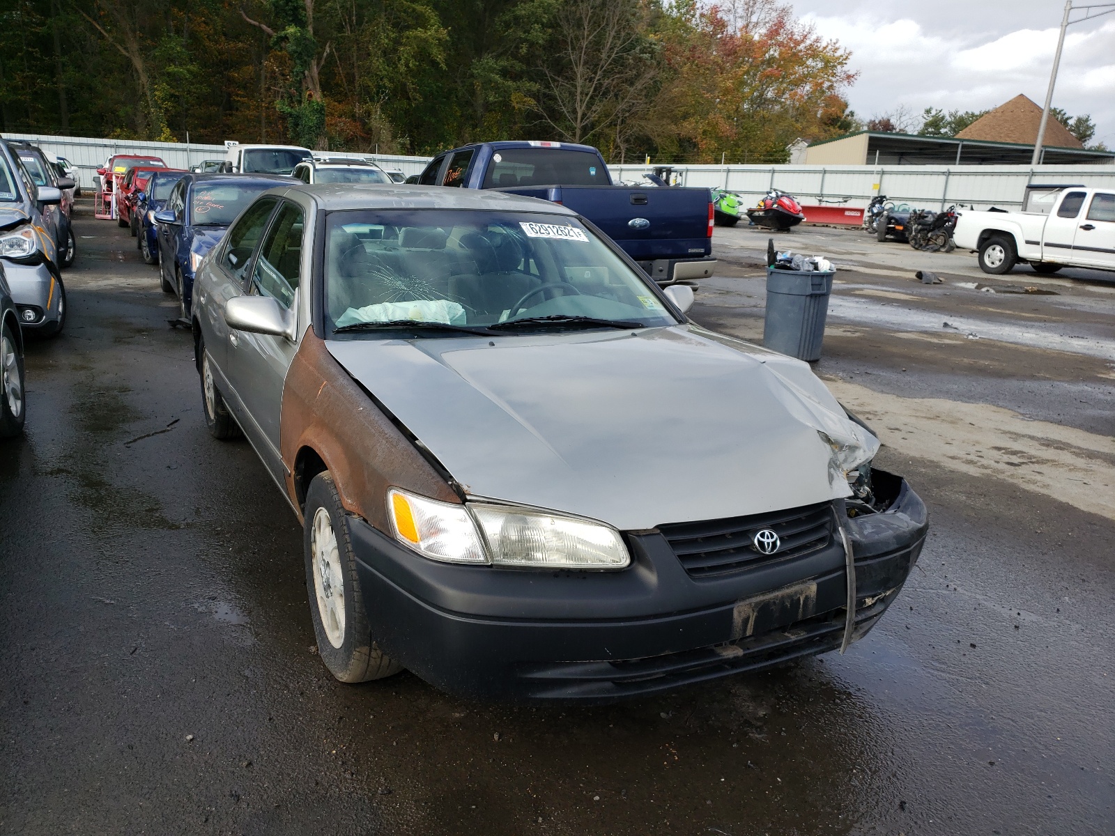 TOYOTA CAMRY LE 1999 with VIN JT2BF22K0X0190404 - Photo from auction