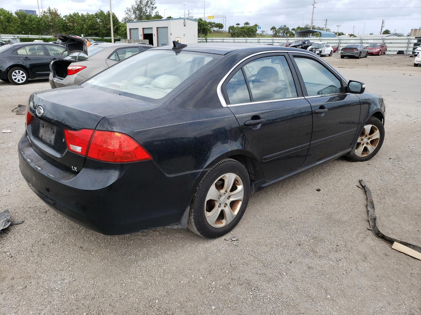 Photo 4 from auction – 2009 KIA OPTIMA with VIN KNAGE228895310215