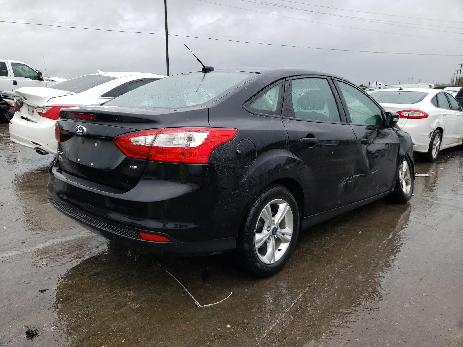 Photo 4 from auction – 2013 FORD FOCUS SE with VIN 1FADP3F22DL210018