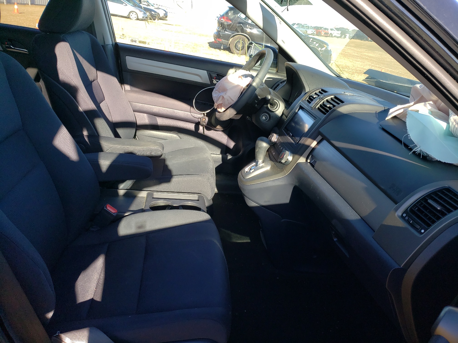 Photo 5 from auction – 2011 HONDA CR-V LX with VIN 5J6RE4H36BL811490