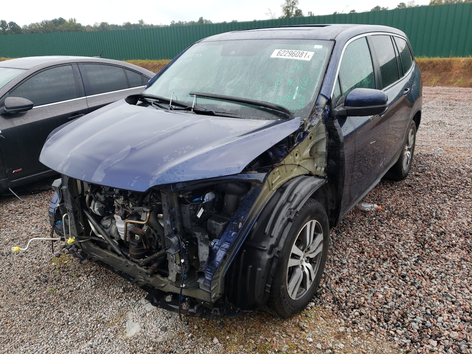 Photo 2 from auction – 2016 HONDA PILOT EXL with VIN 5FNYF5H6XGB022879