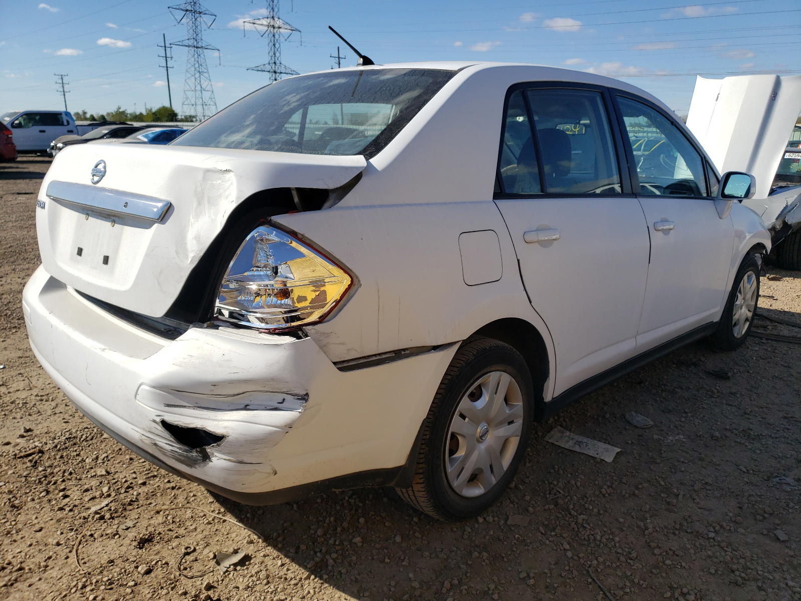 Photo 4 from auction – 2010 NISSAN VERSA S with VIN 3N1BC1AP2AL415538