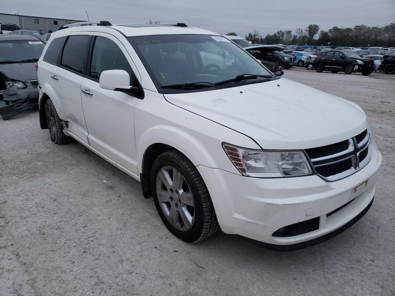 DODGE JOURNEY R/ 2011 with VIN 3D4PH6FG2BT518280 - Photo from auction