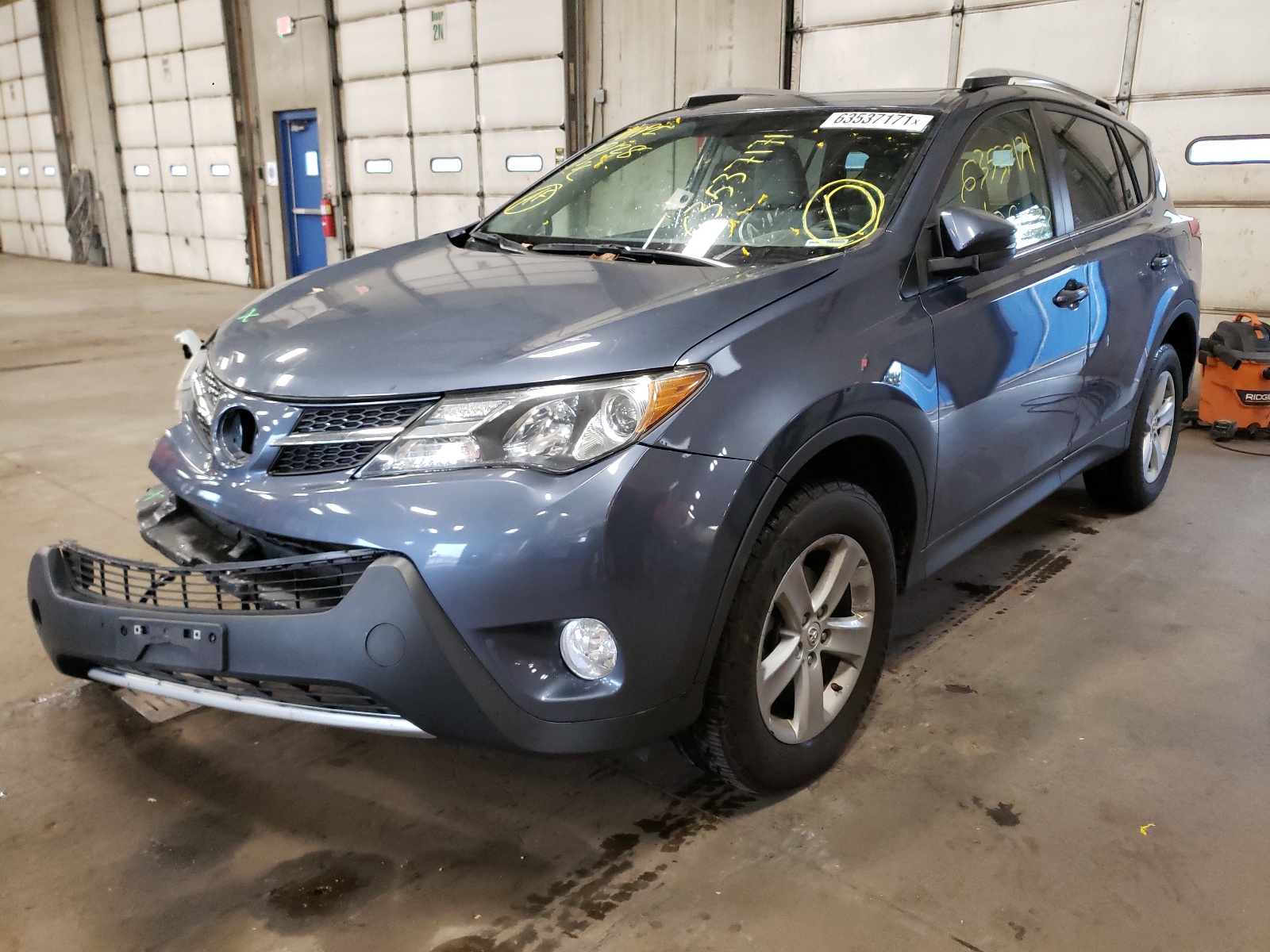 Photo 2 from auction – 2014 TOYOTA RAV4 XLE with VIN JTMWFREV9ED039770