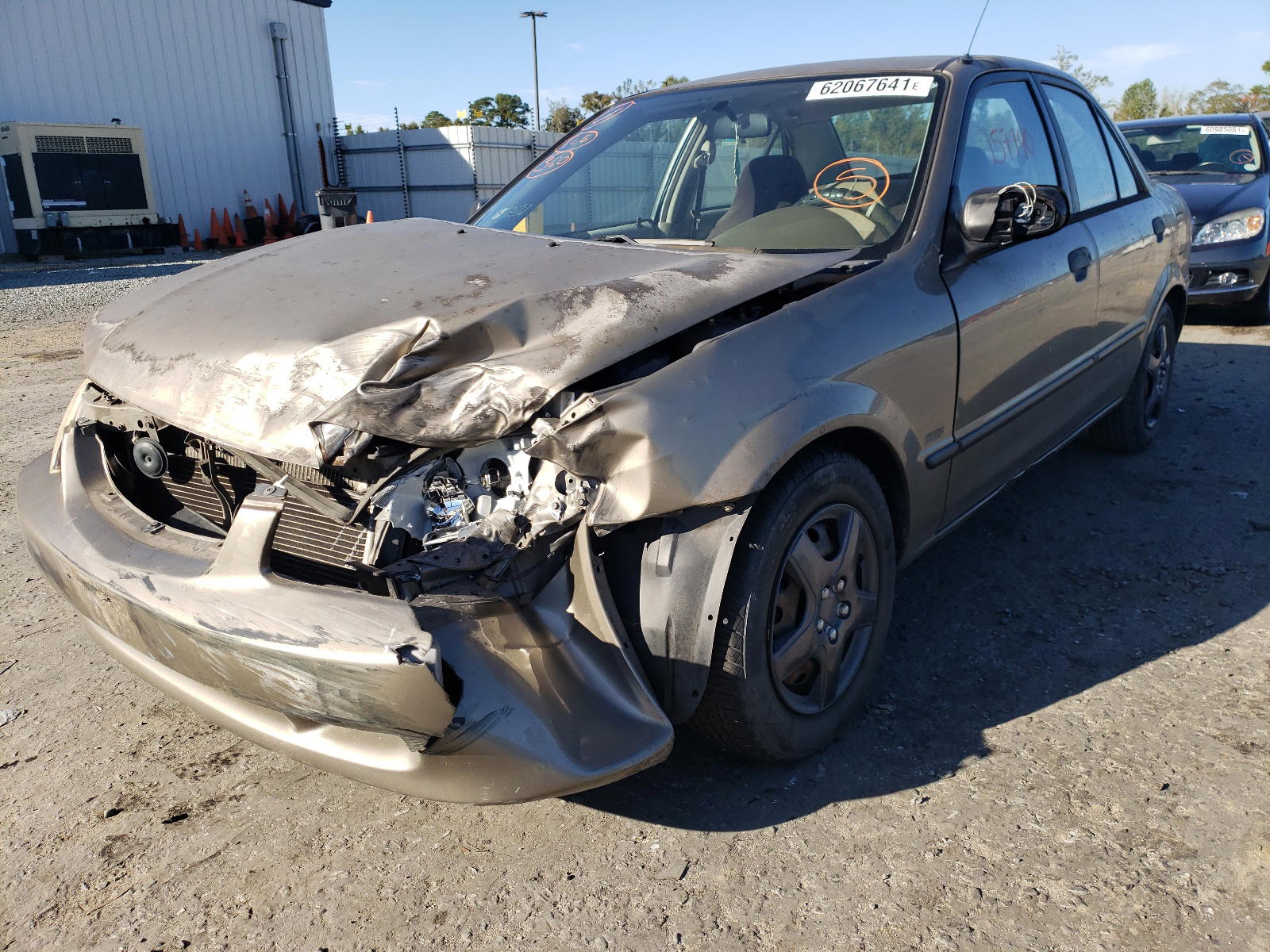 Photo 2 from auction – 2000 MAZDA PROTEGE with VIN JM1BJ2228Y0258228