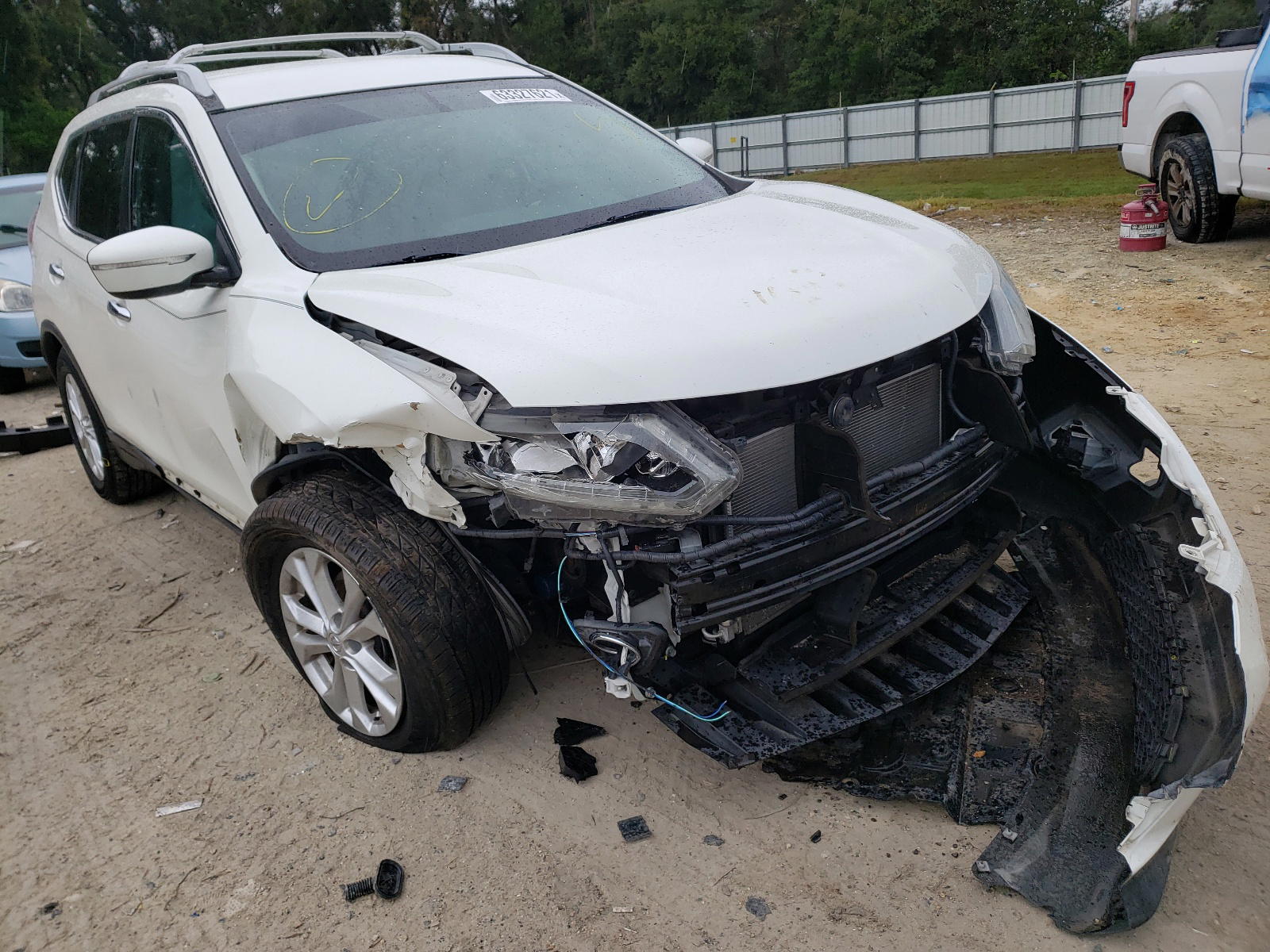 NISSAN ROGUE S 2015 with VIN 5N1AT2MT7FC767147 - Photo from auction