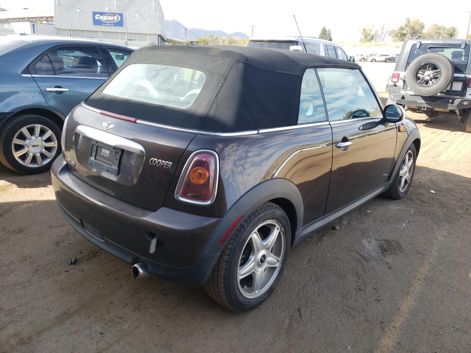 Photo 16 from auction – 2009 MINI COOPER with VIN WMWMR33519TJ93929