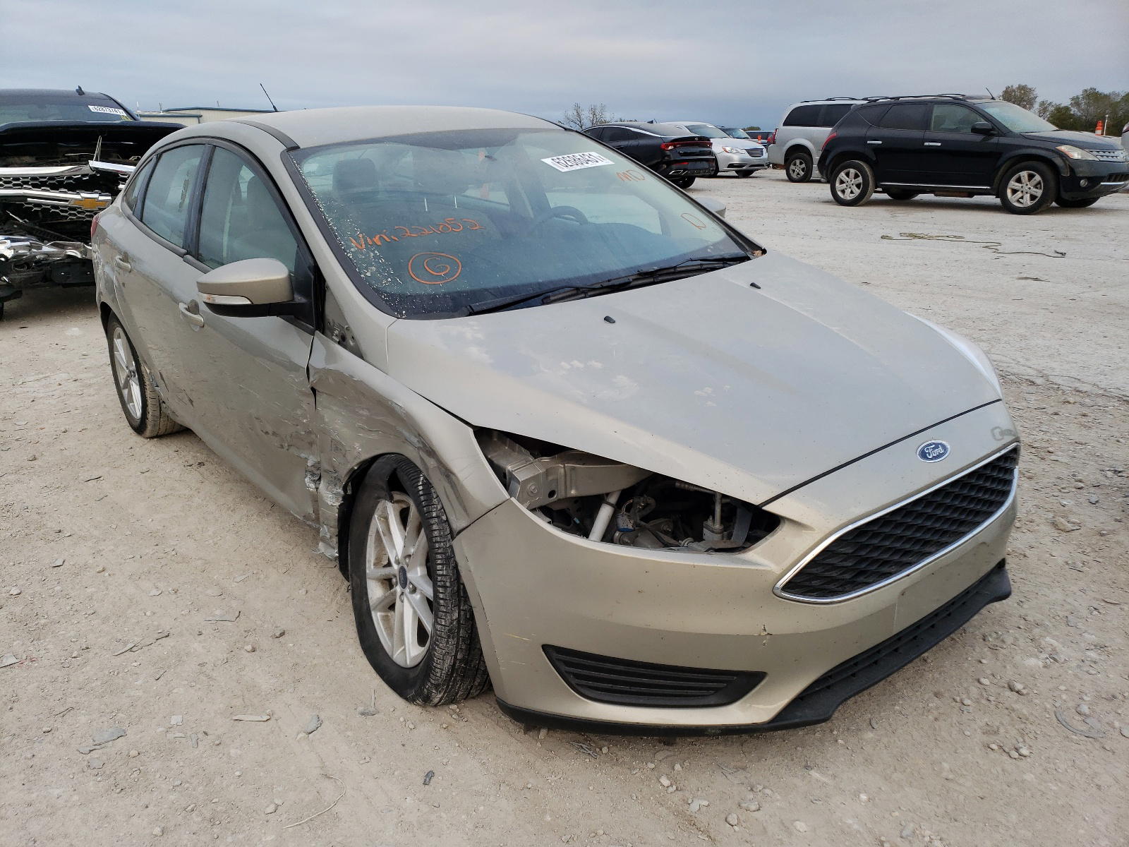 FORD FOCUS SE 2016 with VIN 1FADP3F27GL221052 - Photo from auction