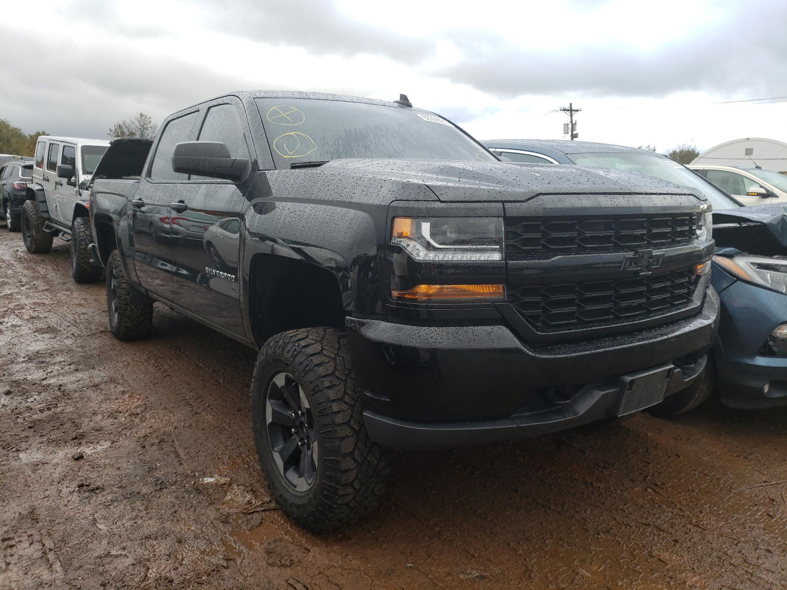 CHEVROLET SILVERADO 2018 with VIN 3GCUKPEC5JG370655 - Photo from auction