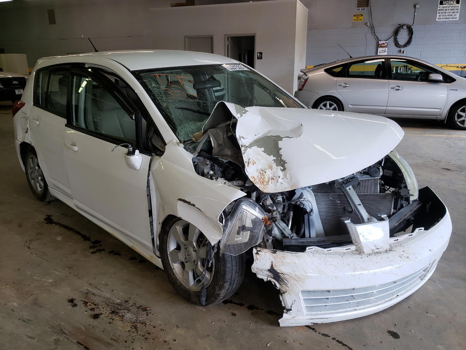 Photo 9 from auction – 2011 NISSAN VERSA S with VIN 3N1BC1CP5BL412244