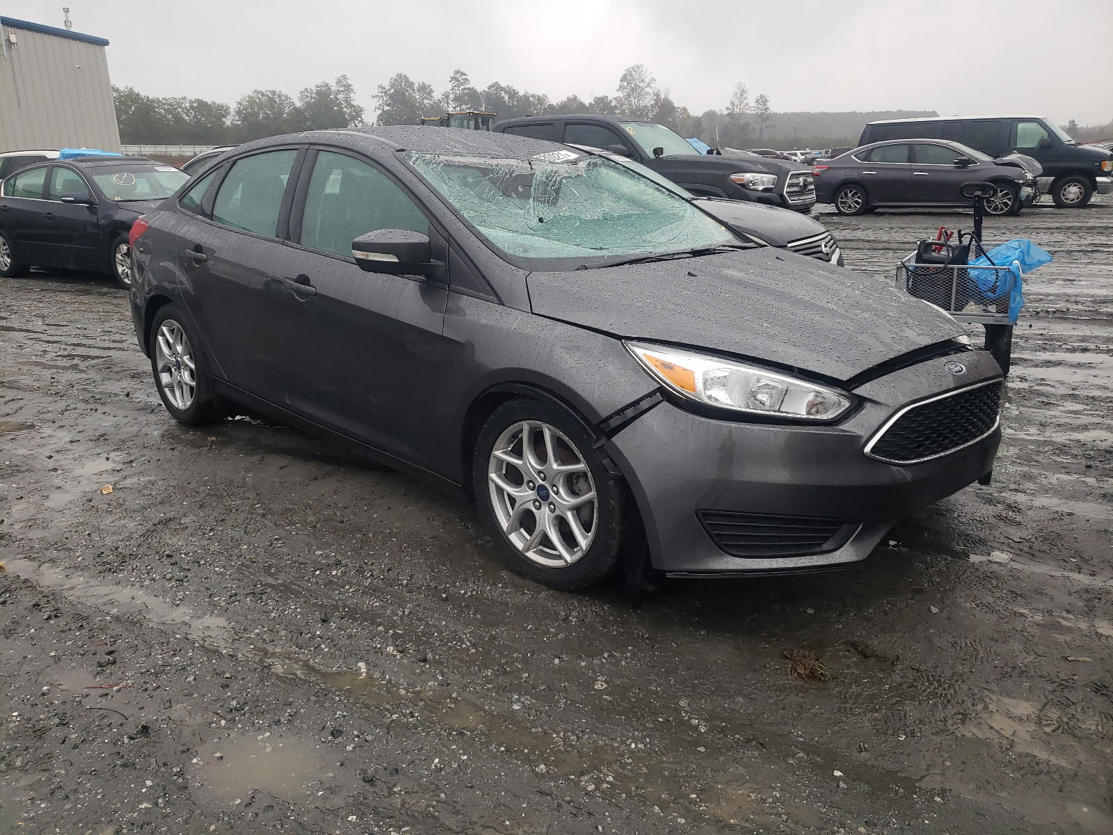 FORD FOCUS SE 2017 with VIN 1FADP3F21HL322377 - Photo from auction