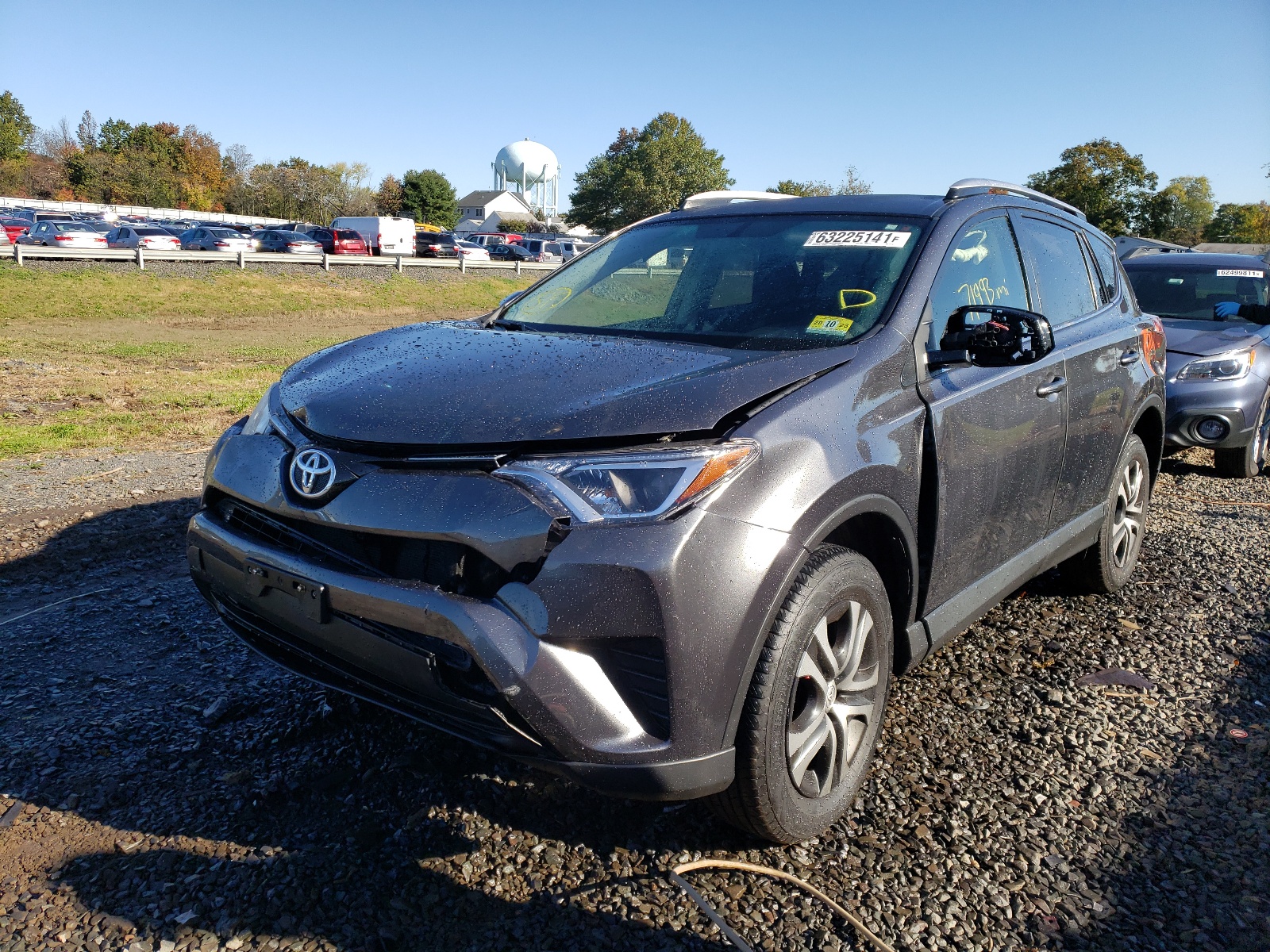 Photo 2 from auction – 2016 TOYOTA RAV4 LE with VIN JTMZFREV9GJ099856