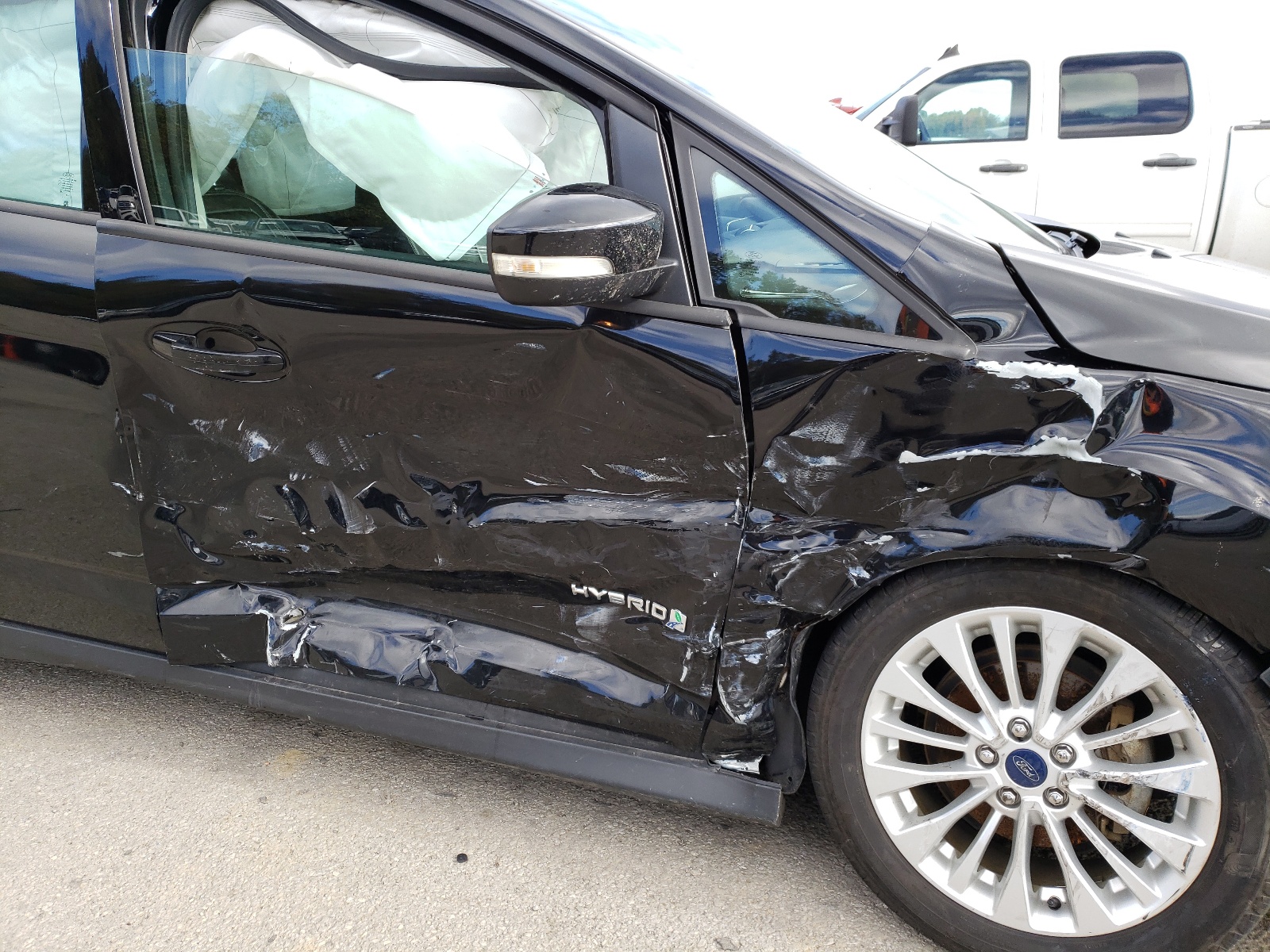 Photo 5 from auction – 2017 FORD C-MAX SE with VIN 1FADP5AU9HL106362