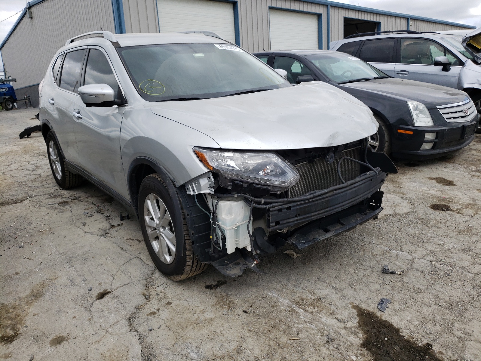 NISSAN ROGUE S 2015 with VIN 5N1AT2MKXFC764749 - Photo from auction