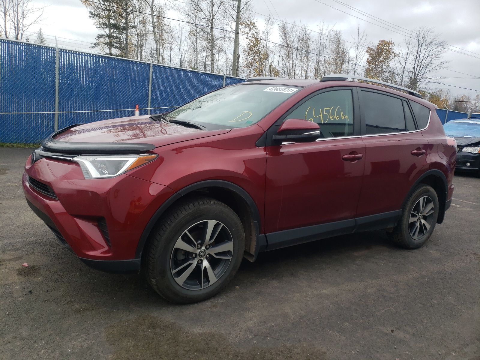 Photo 2 from auction – 2018 TOYOTA RAV4 LE with VIN 2T3BFREVXJW825864