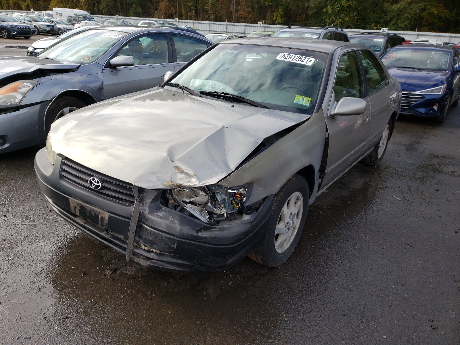 Photo 2 from auction – 1999 TOYOTA CAMRY LE with VIN JT2BF22K0X0190404