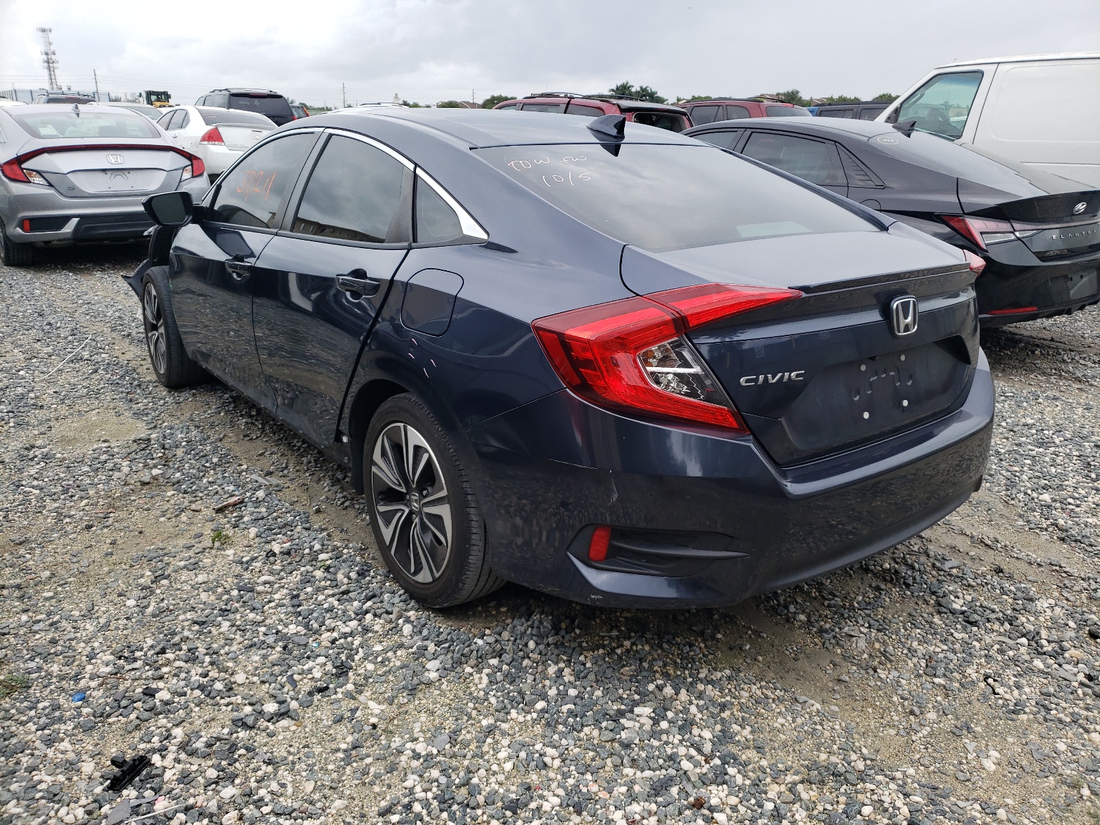 Photo 3 from auction – 2018 HONDA CIVIC EXL with VIN JHMFC1F74JX043002