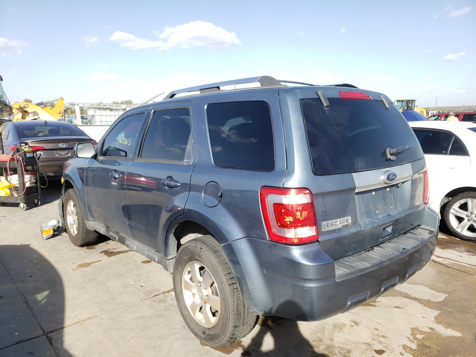 Photo 3 from auction – 2010 FORD ESCAPE LIM with VIN 1FMCU0E75AKD32363