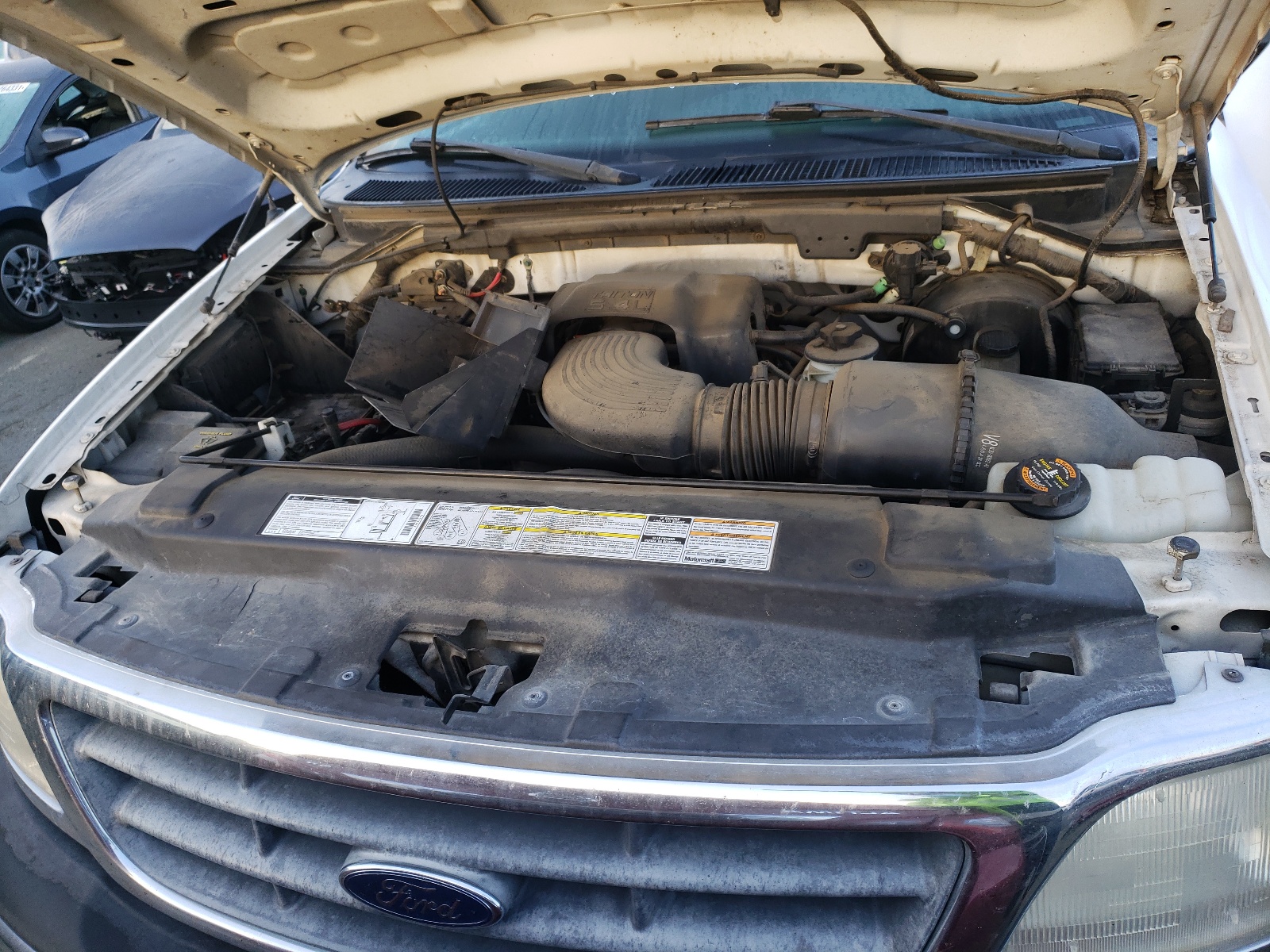 Photo 7 from auction – 2000 FORD F150 with VIN 1FTPX17L0YKB18341