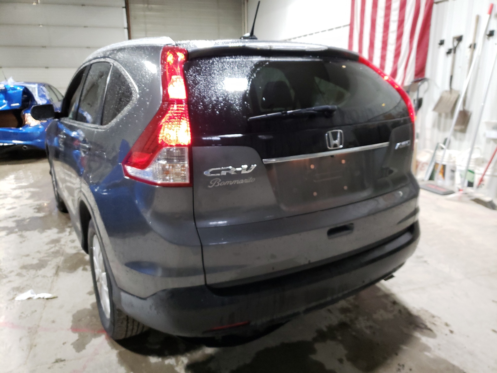 Photo 3 from auction – 2014 HONDA CR-V EXL with VIN 5J6RM4H73EL093620