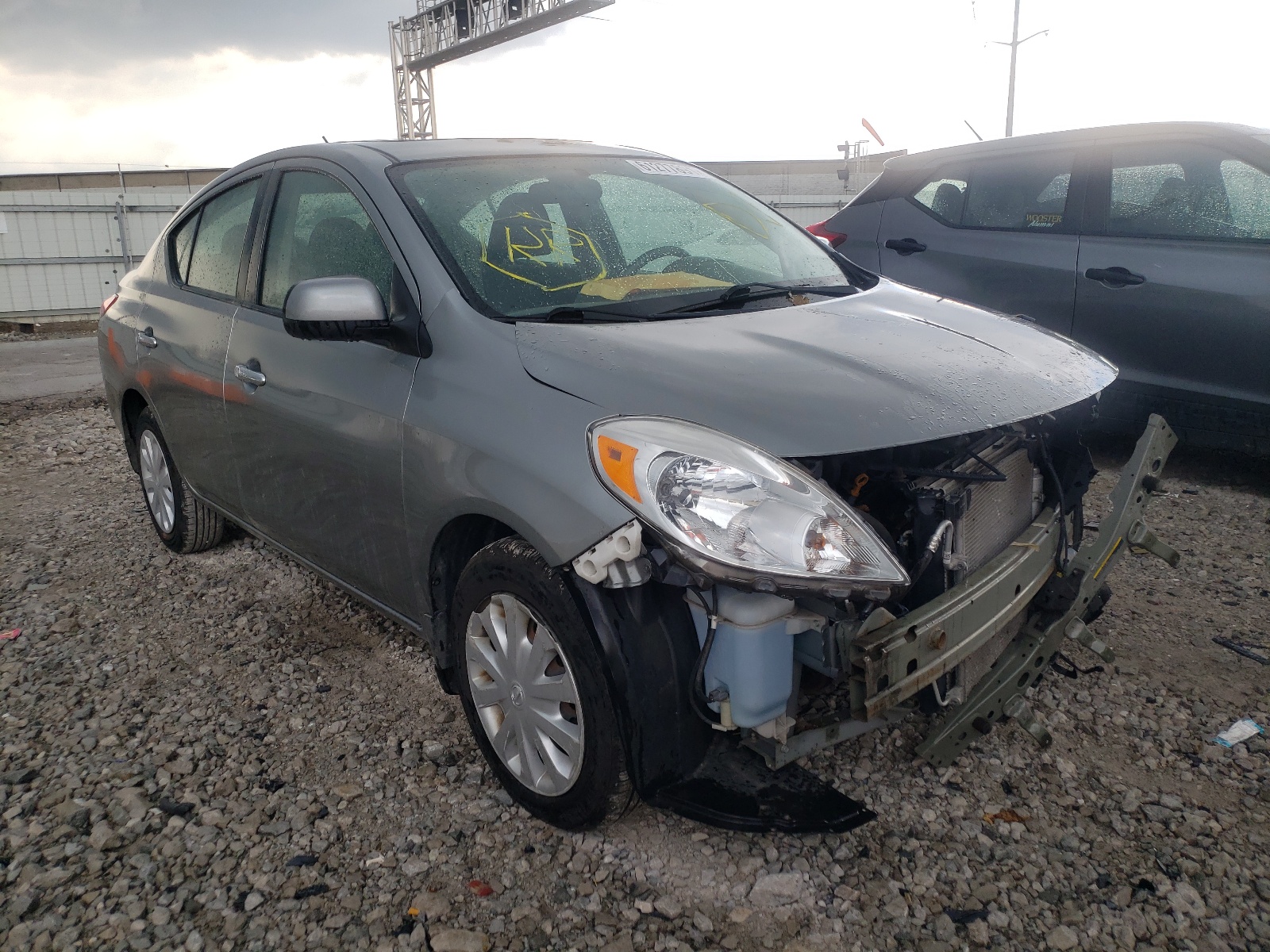 NISSAN VERSA S 2012 with VIN 3N1CN7AP6CL889450 - Photo from auction