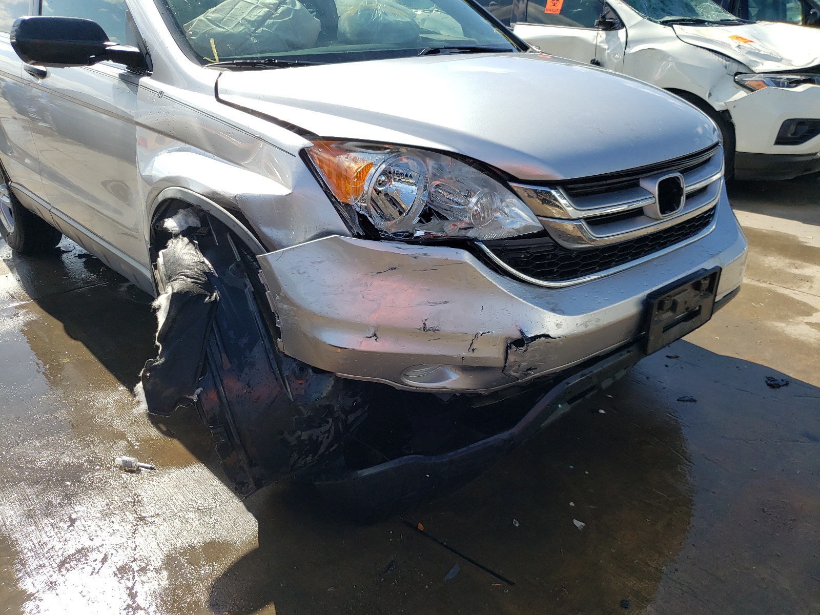 Photo 9 from auction – 2011 HONDA CR-V EX with VIN JHLRE3H51BC005142