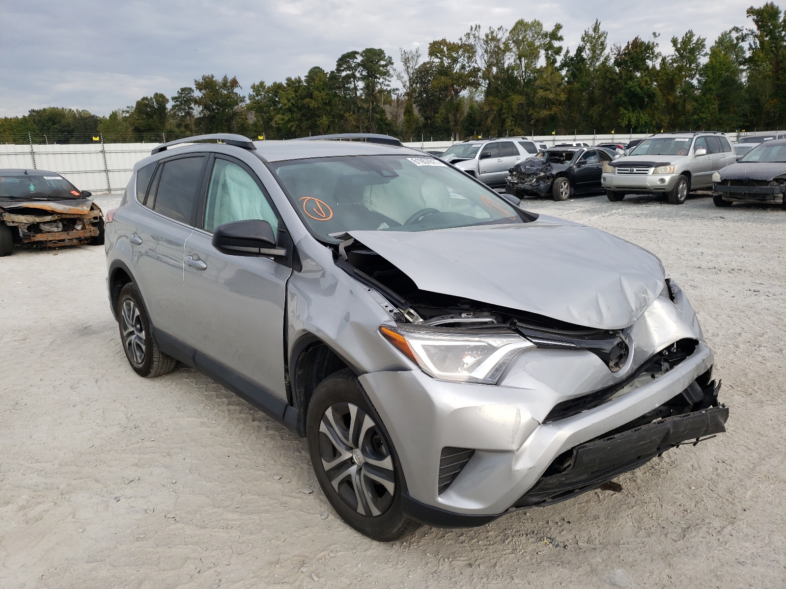 Photo 1 from auction – 2018 TOYOTA RAV4 LE with VIN 2T3ZFREV1JW522308