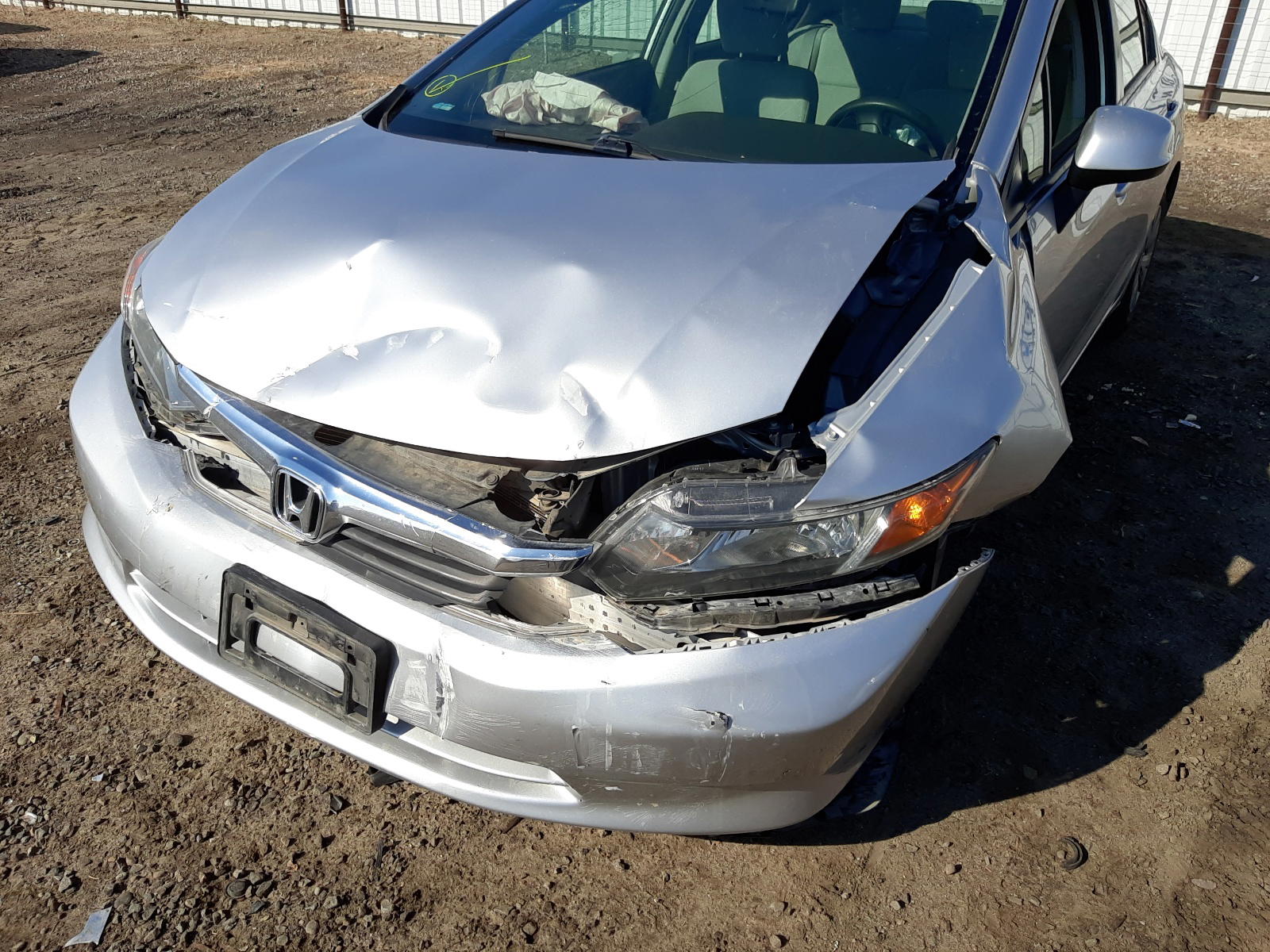 Photo 9 from auction – 2012 HONDA CIVIC LX with VIN JHMFB2F58CS004985