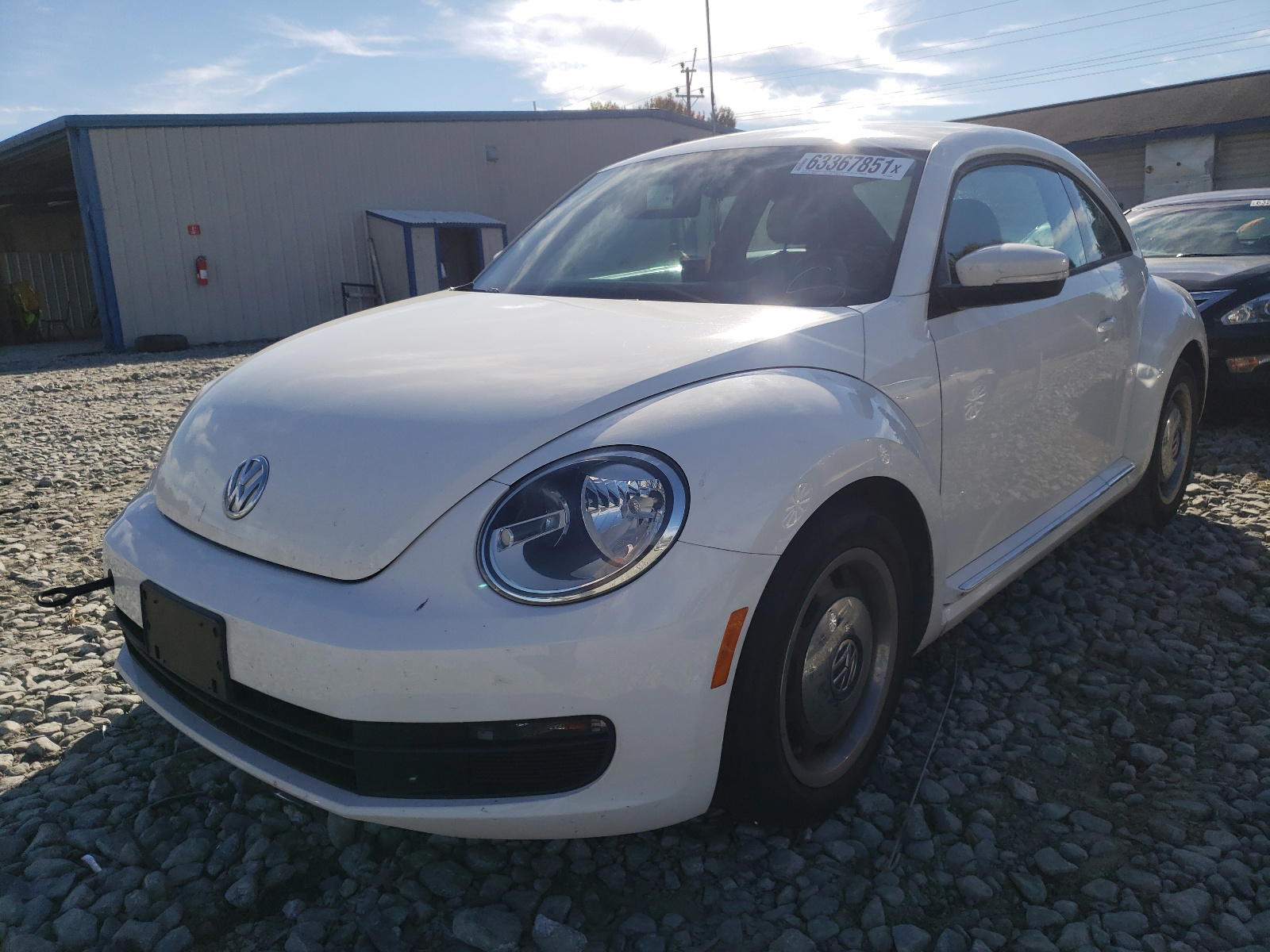 Photo 2 from auction – 2012 VOLKSWAGEN BEETLE with VIN 3VWJP7AT3CM611530